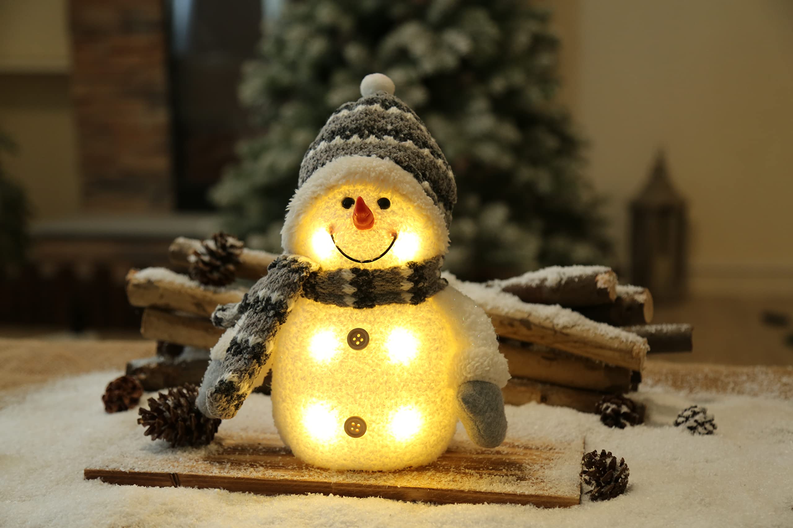 Decorazione Di Natale, Pupazzi Di Neve Vesti Come Santa Claus E Luce Rossa Image130605227