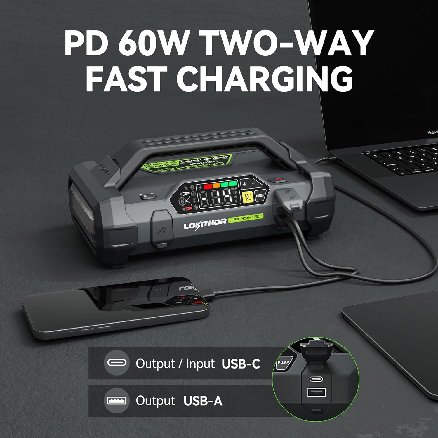 LOKITHOR JA3000 unit charging a smartphone and laptop