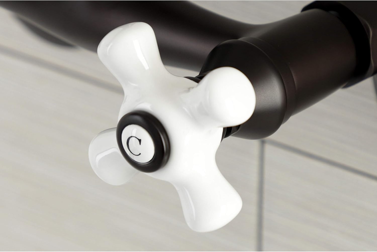 Kingston Brass KS612ORB Kingston Two-Handle 2-Hole Wall Mount Bar Faucet in Oil Rubbed Bronze
