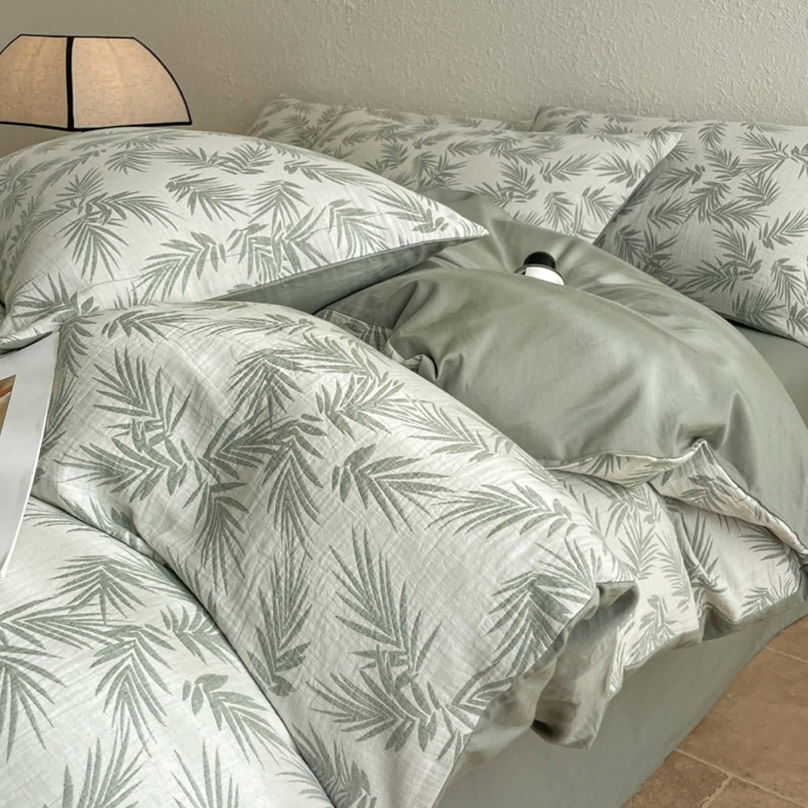 4-częściowy zestaw pościeli, poszwa na kołdrę 200x230cm, prześcieradło z gumką 150x200cm, 2 poszewki na poduszki, wzór liści, miękka bawełna, jasnozielony