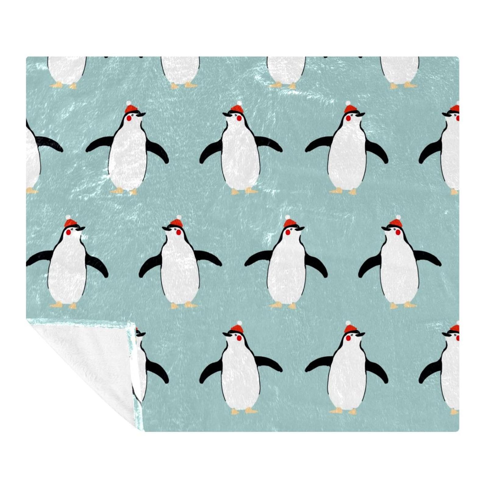 Couverture douce pingouin pour réchauffer vos soirées canapé en hiver