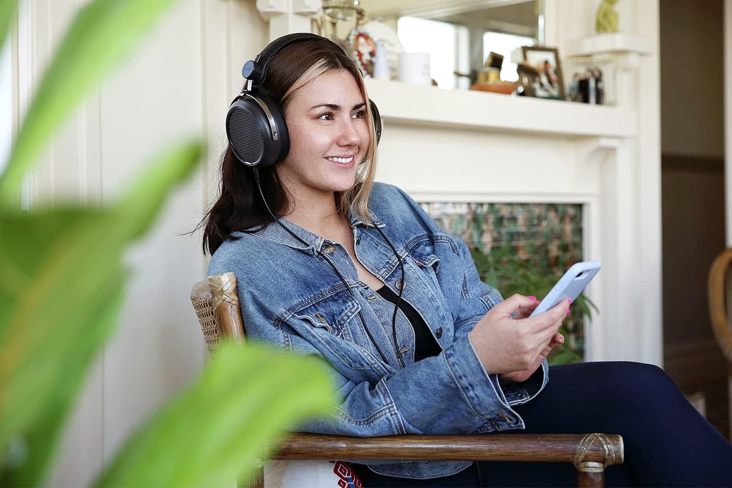 Person wearing DROP + HIFIMAN HE-X4 headphones comfortably.