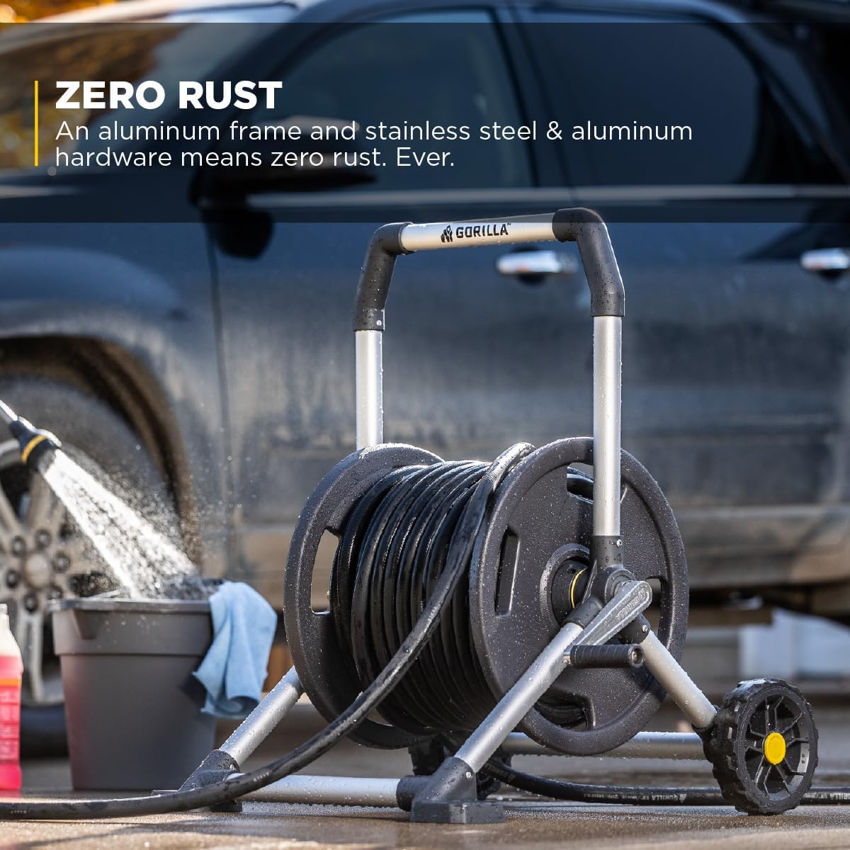 Diagram showing components of the Gorilla hose reel including zero-rust aluminum frame, heavy-duty brass fittings, high-impact blow-molded reel, cast aluminum crank handle, 7-inch solid flat-free wheels, and 6-foot heavy-duty leader hose.