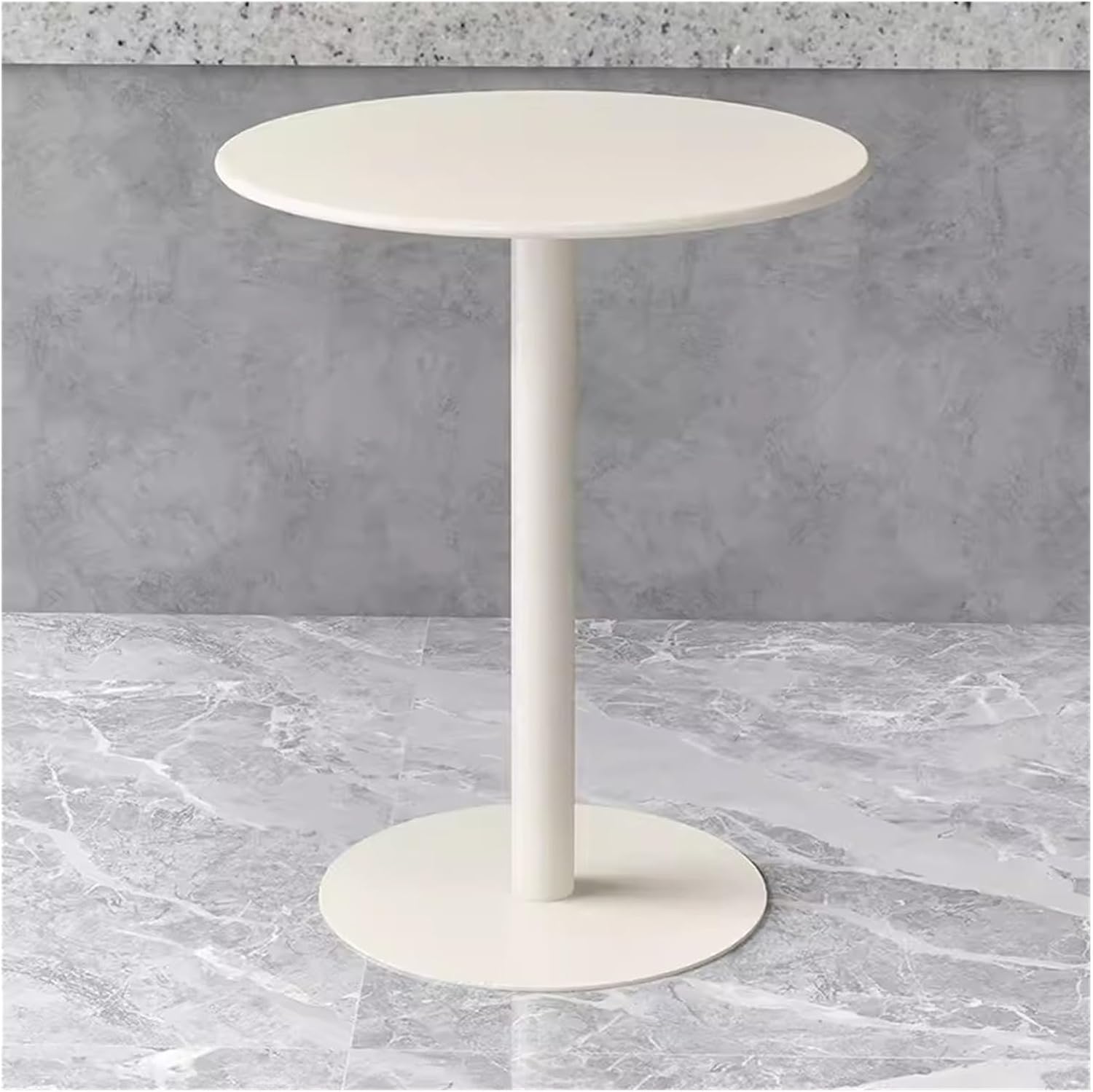 Table de bistrot en fer pour gagner de la place dans votre studio