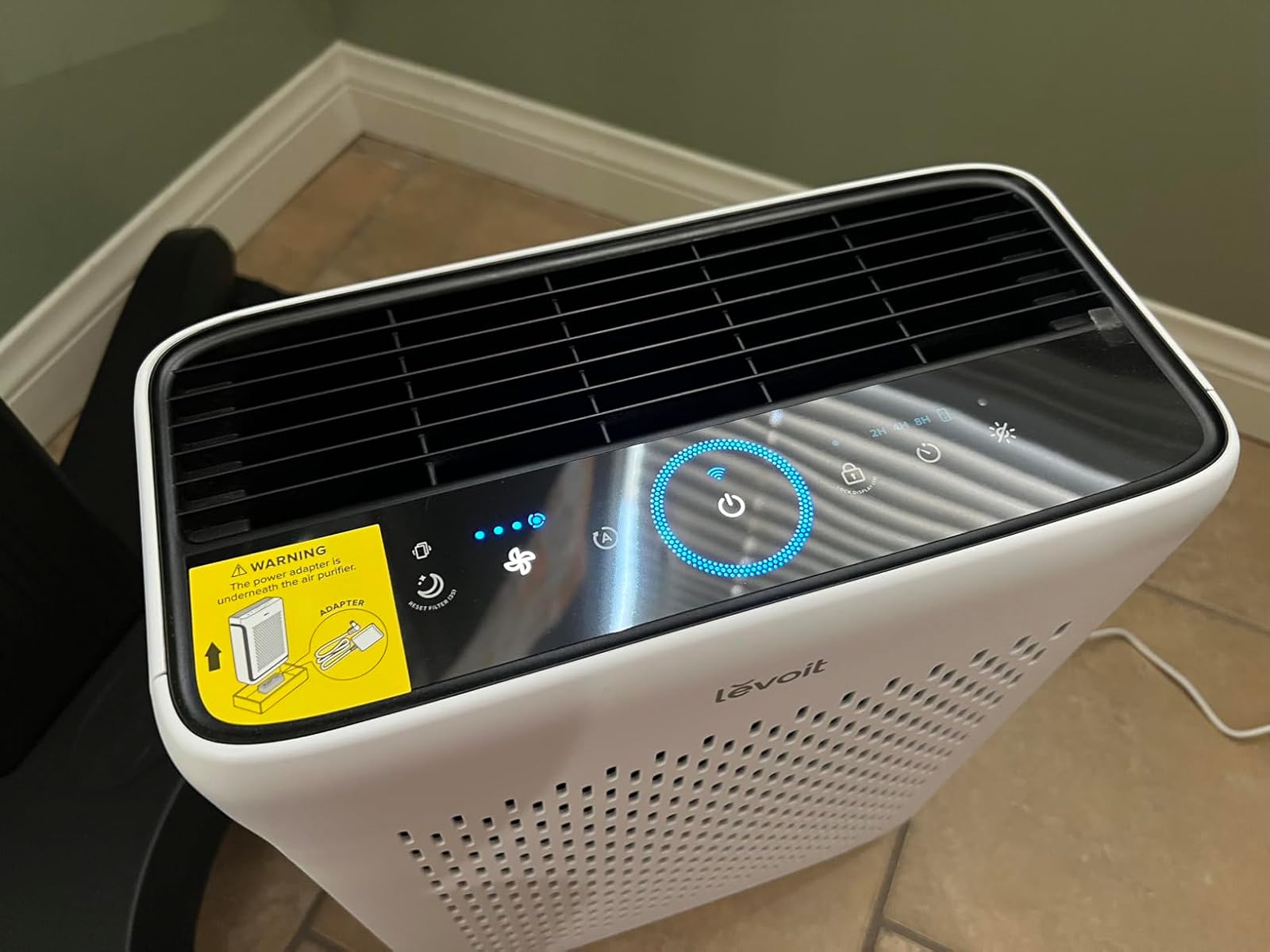 Levoit Vital 100S-P air purifier with pre-filter showing dust accumulation after one cleaning session