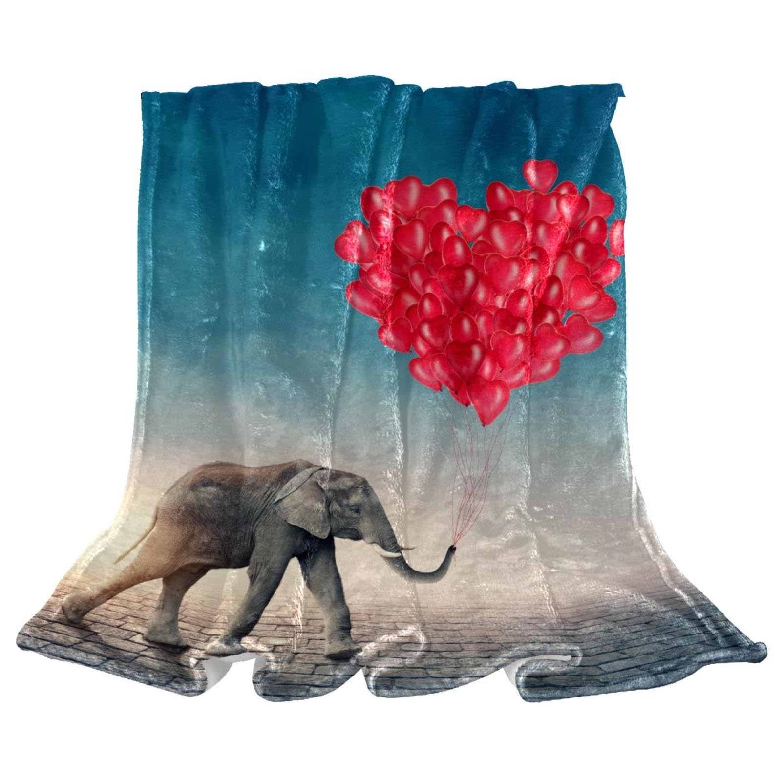 Couverture polaire ballons éléphants pour réchauffer vos soirées cocooning sur le canapé