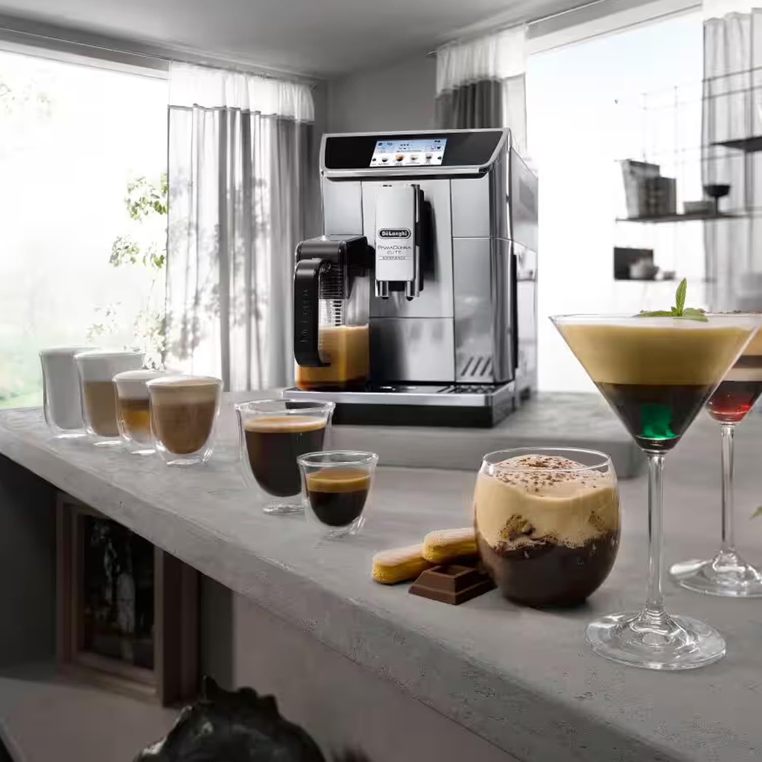 DeLonghi PrimaDonna Elite preparing a layered coffee drink