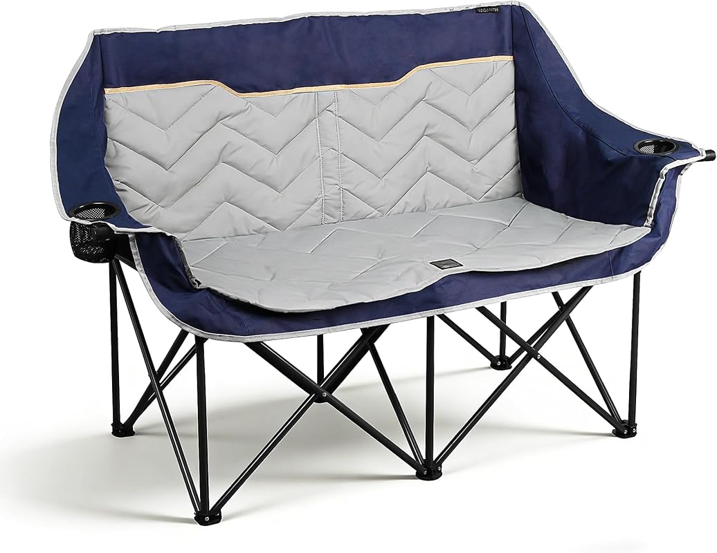 Blue Double Camping Chair Padded Loveseat folded out in a backyard patio setting with cup holders