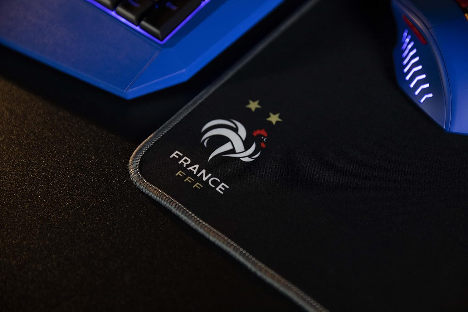 Close-up of Konix FFF Gaming Mouse Mat surface with logo