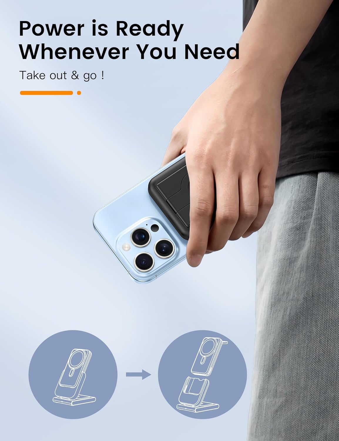 Hand holding an iPhone with the detachable power bank attached, illustrating portability.