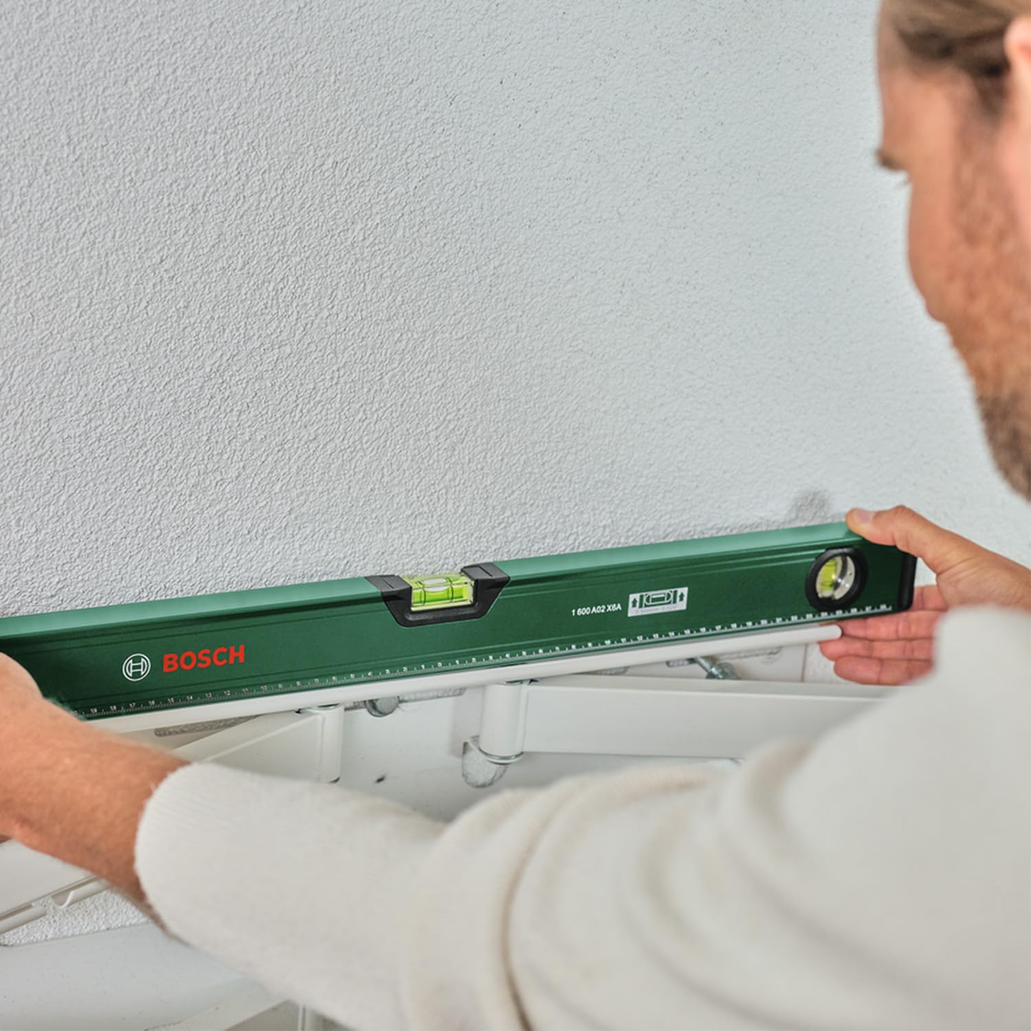 Bosch poziomica 60 cm (2 suwaki do zaznaczania, fluorescencyjna libella (pozioma i pionowa), skala metryczna, aluminiowy korpus, stopery z miękką okładziną Softgrip, rowek typu V)