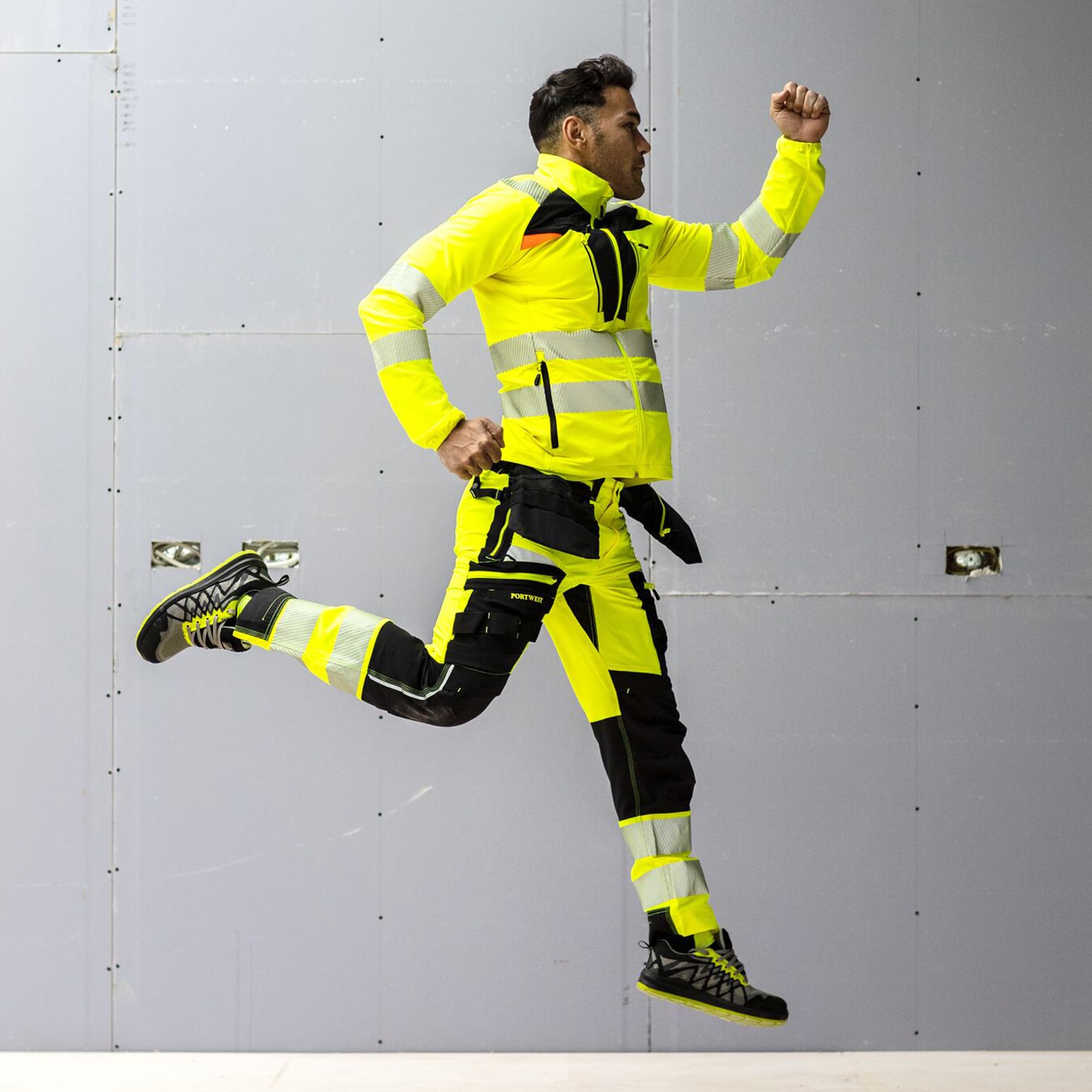 Giacca alta visibilità traspirante, modello Stretch dinamico DX4, 92% poliestere - 8% Elastan 210 gr, omologata EN ISO 20471, colore giallo/nero