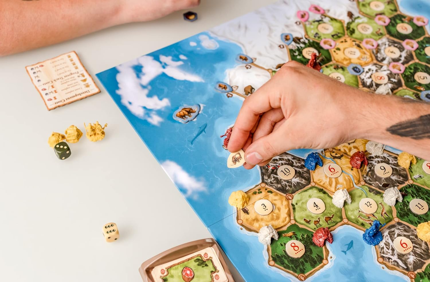 Catan Studios Dawn of Humankind: CATAN Gra planszowa w wieku 12+ 3-4 graczy 90+ minut czasu gry, CN3206