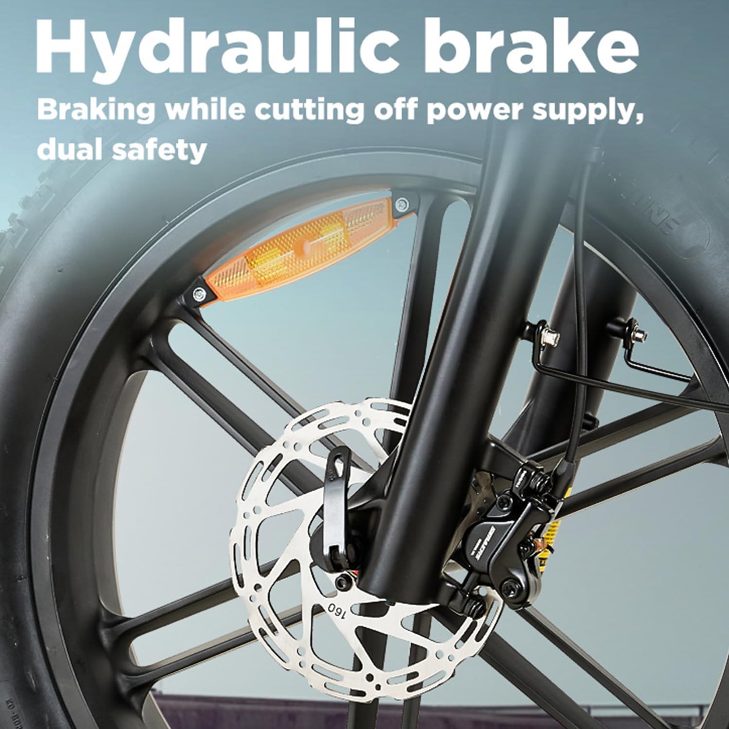 Close-up of the hydraulic disc brake on the front wheel of the BURCHDA AZ20 E-MTB