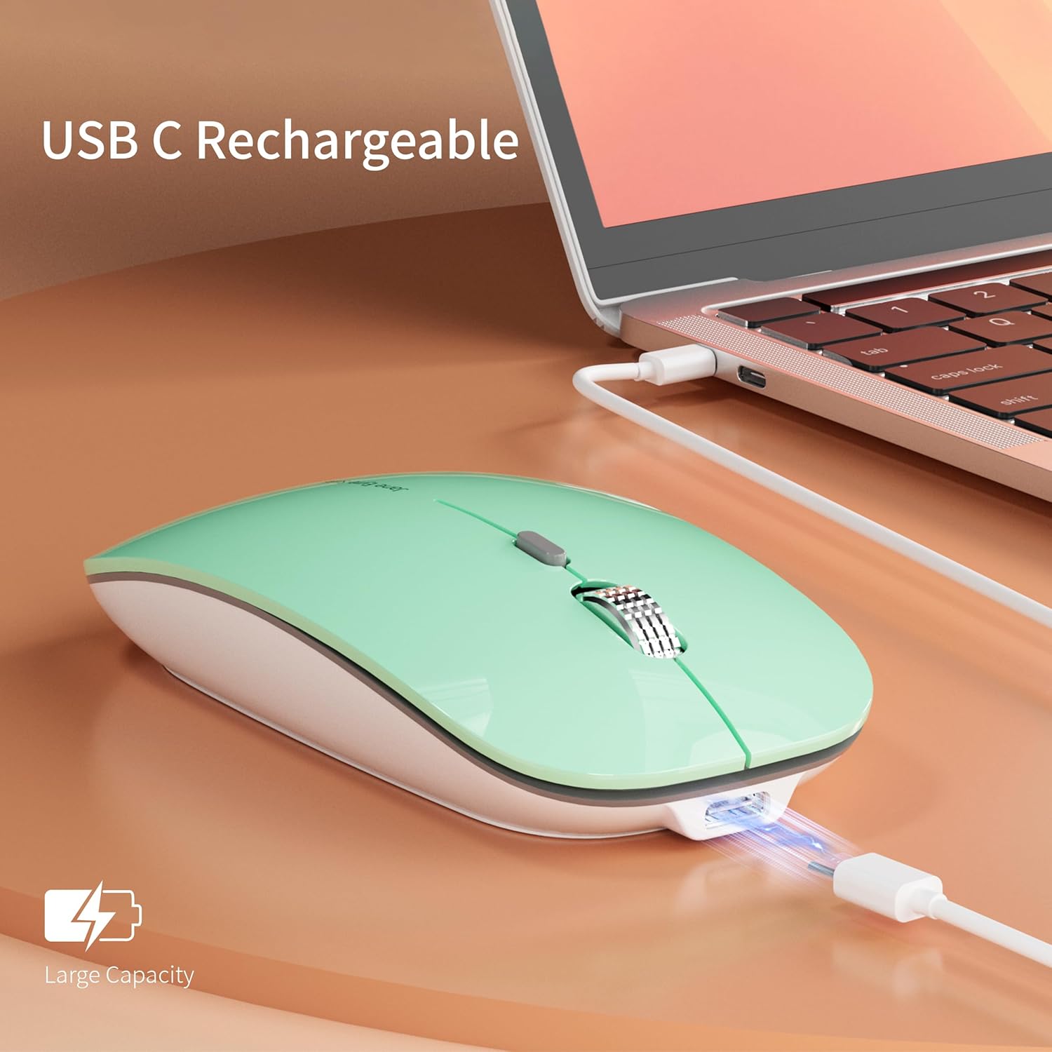 Uciefy Q5 mouse connected to a laptop for charging