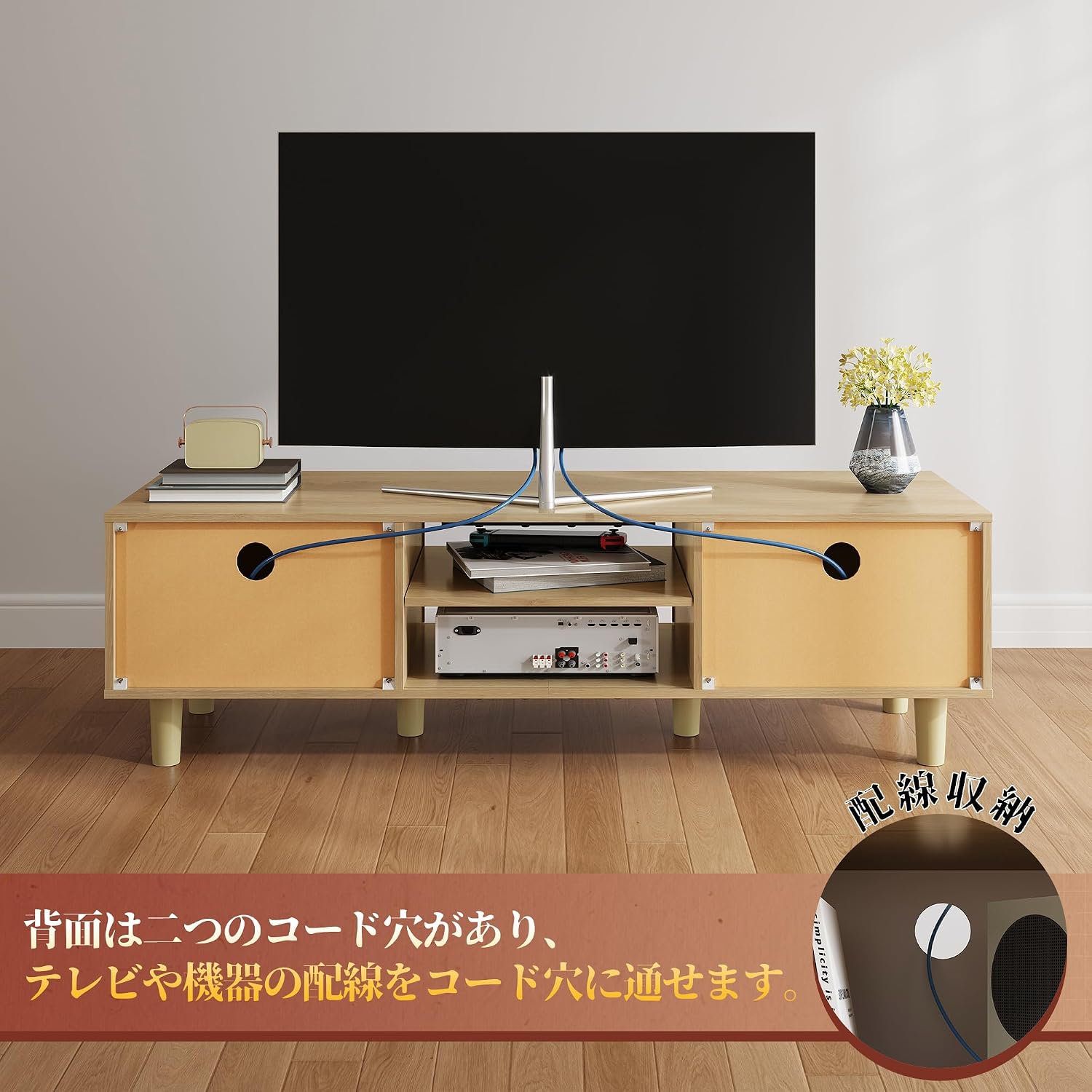 Close-up of the cable management holes at the back of the TV stand.