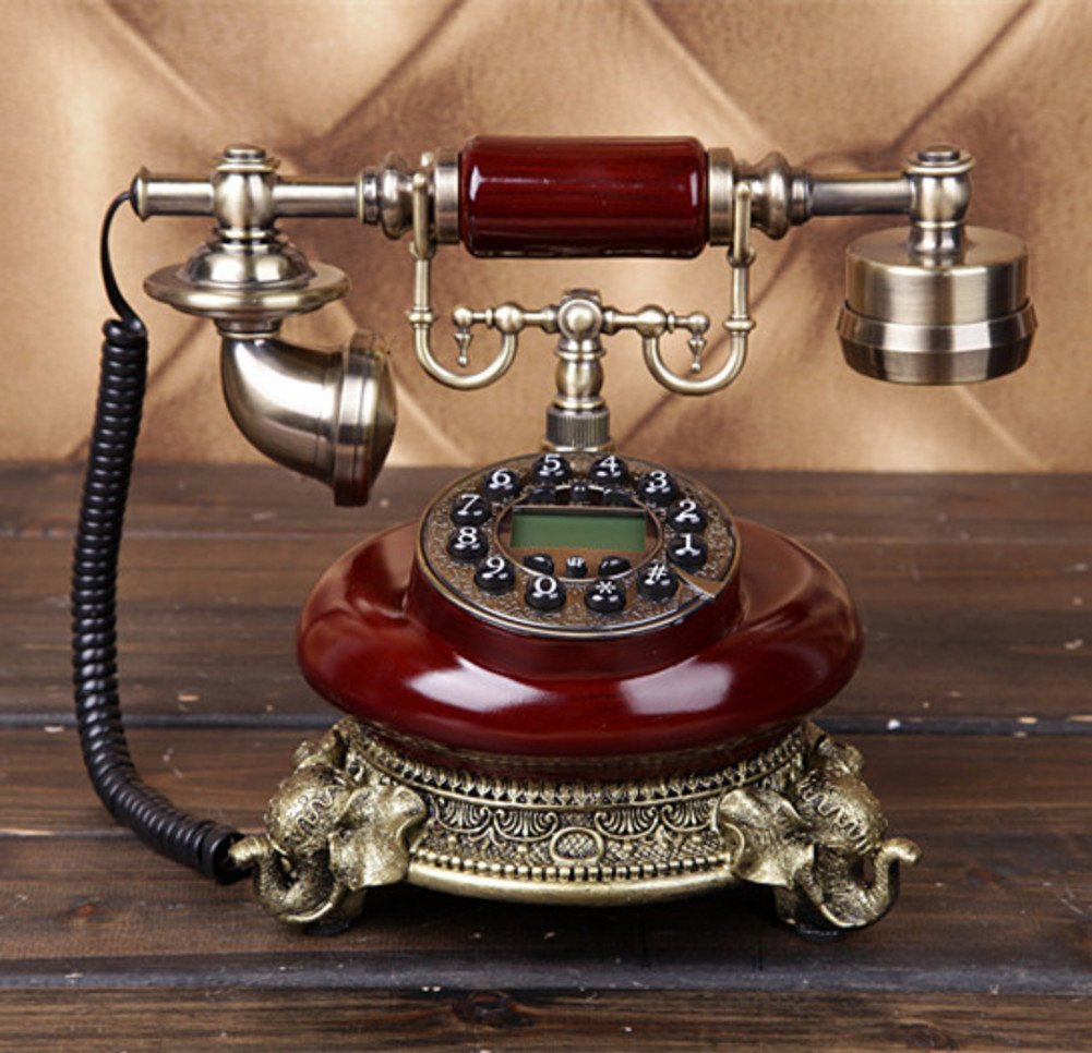 Téléphone antique fixe de bureau et maison rétro chic