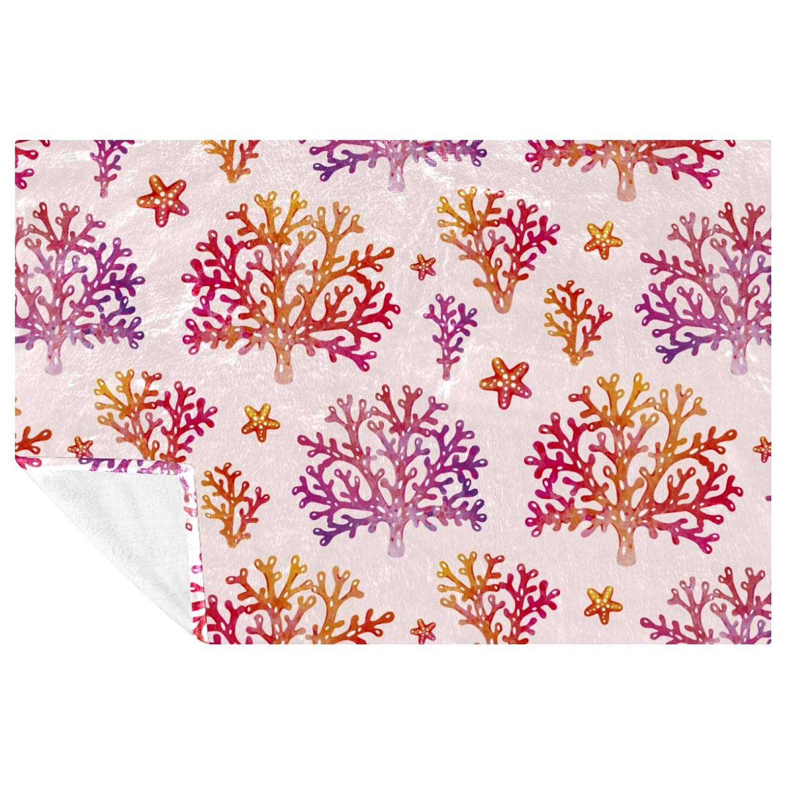 Couverture douce motif corail rouge pour réchauffer vos moments en famille
