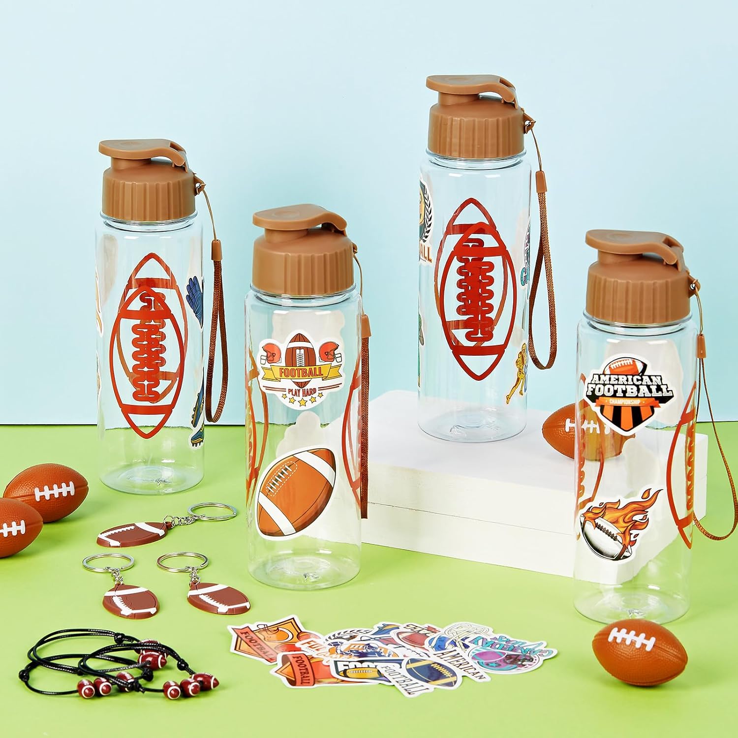 LemonRoad 164 Pcs Sports Party Favors Set 16 Plastic Cups 16 Charm Bracelets 16 Keychains 16 Mini Foam Stress Balls 100 Stickers for Sports Party Supplies (Football)