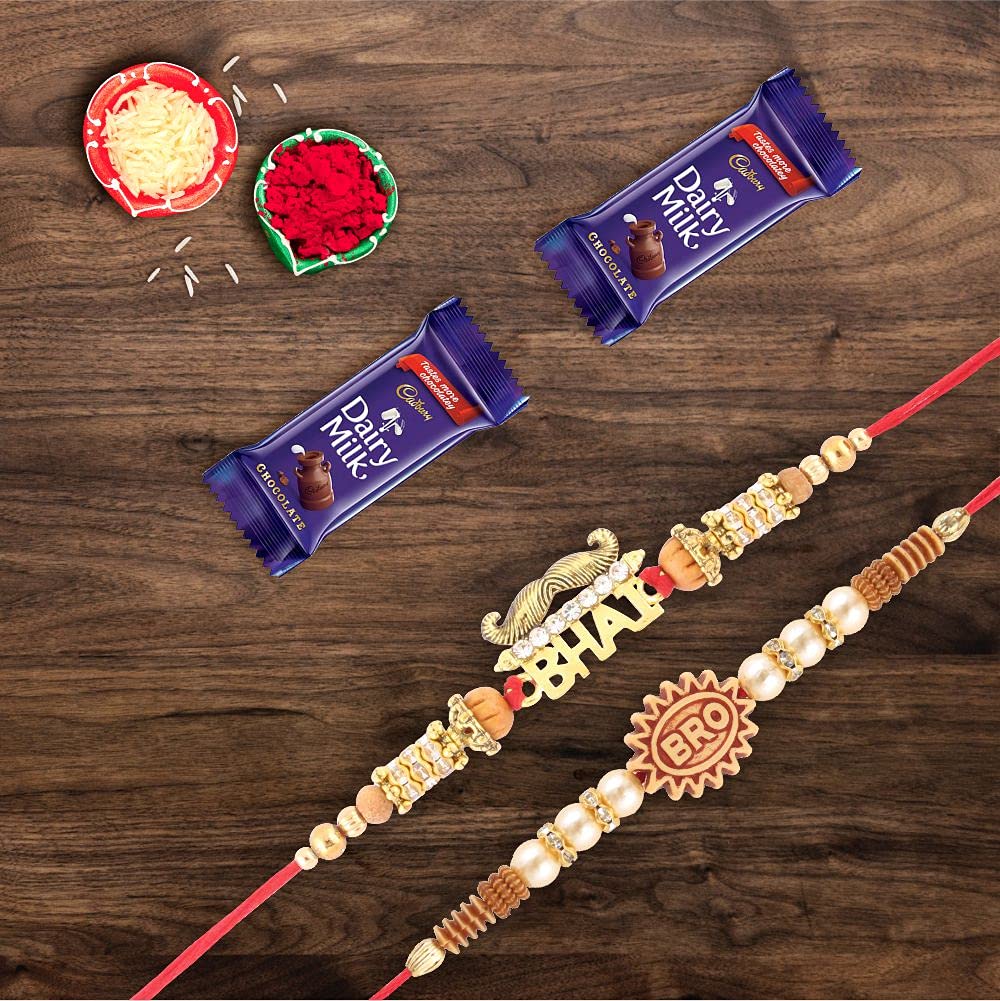 SFU E Com Premium Designer Rakhi with 2 Pieces Cadbury Dairy Milk Chocolates | Rakhi Chocolate Gift for Brother | Roli, Chawal, Chandan, Misri | 15