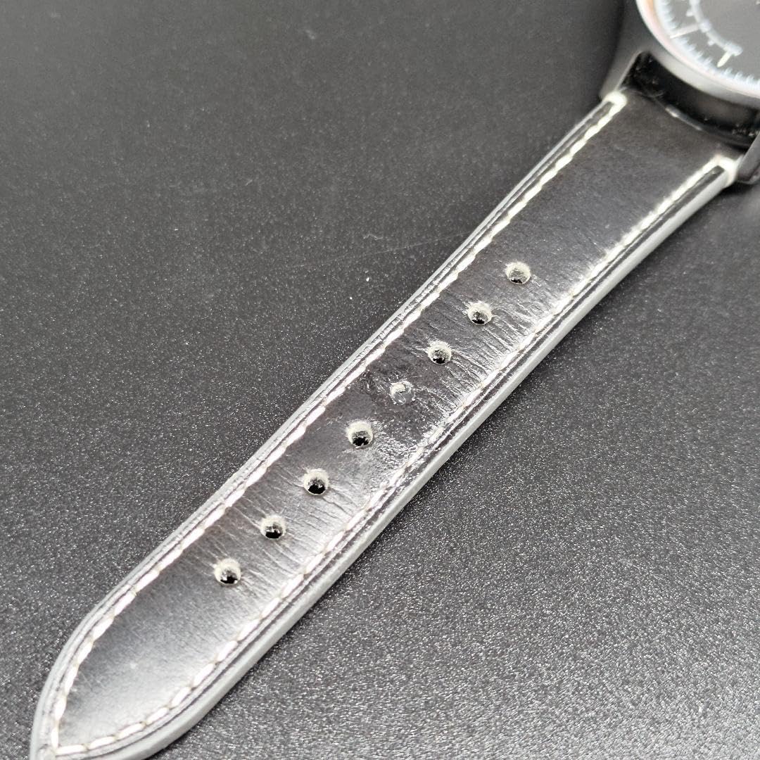 Close-up of the pointed end of the black leather strap of the Knot EH-38 Smartwatch.