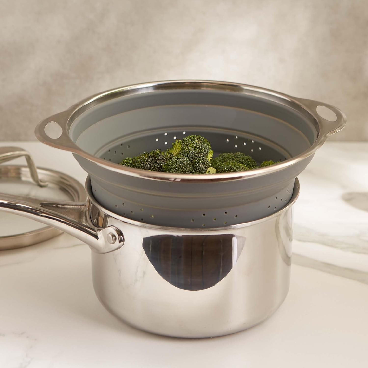 RSVP International Collapsible Silicone & Stainless Steel Colander, Multipurpose Kitchen Steamer Strainer, Heat Safe Up to 445°F (230°C) Collapses Flat for Compact Storage, 9.5-Inches Diameter