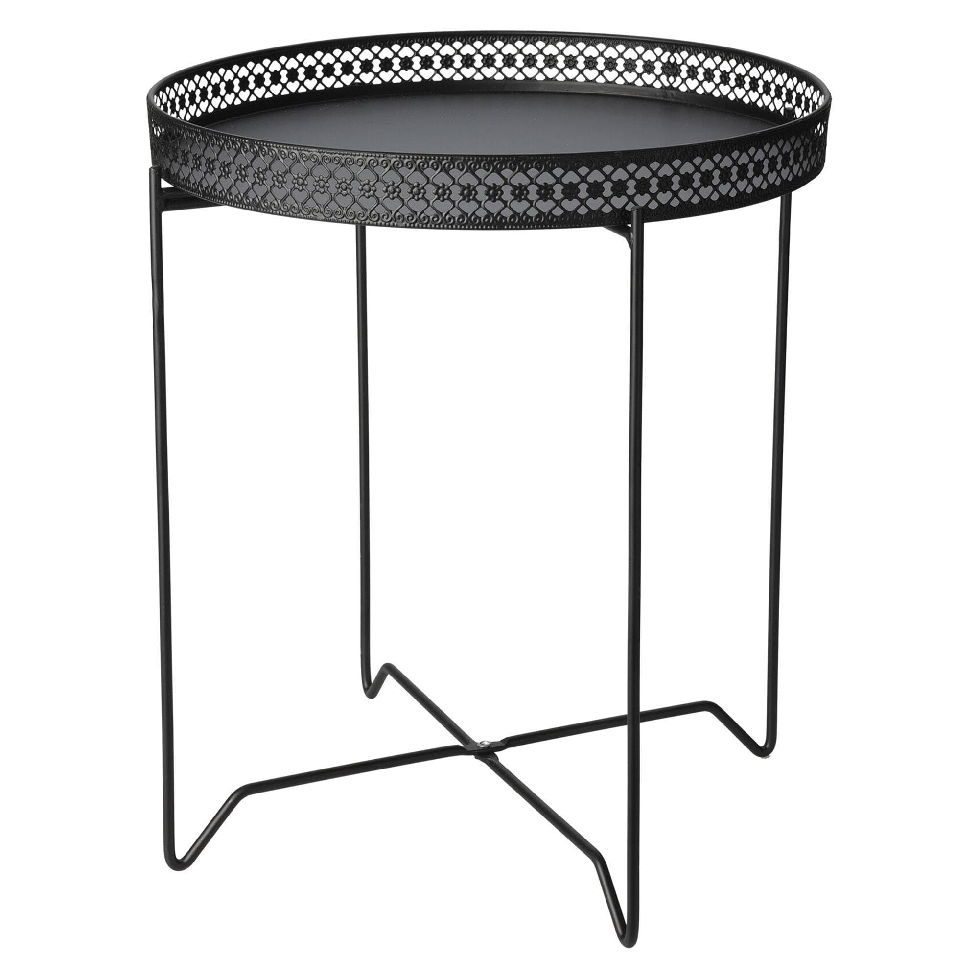 Mesa redonda en metal para tomar café junto al sofá del salón