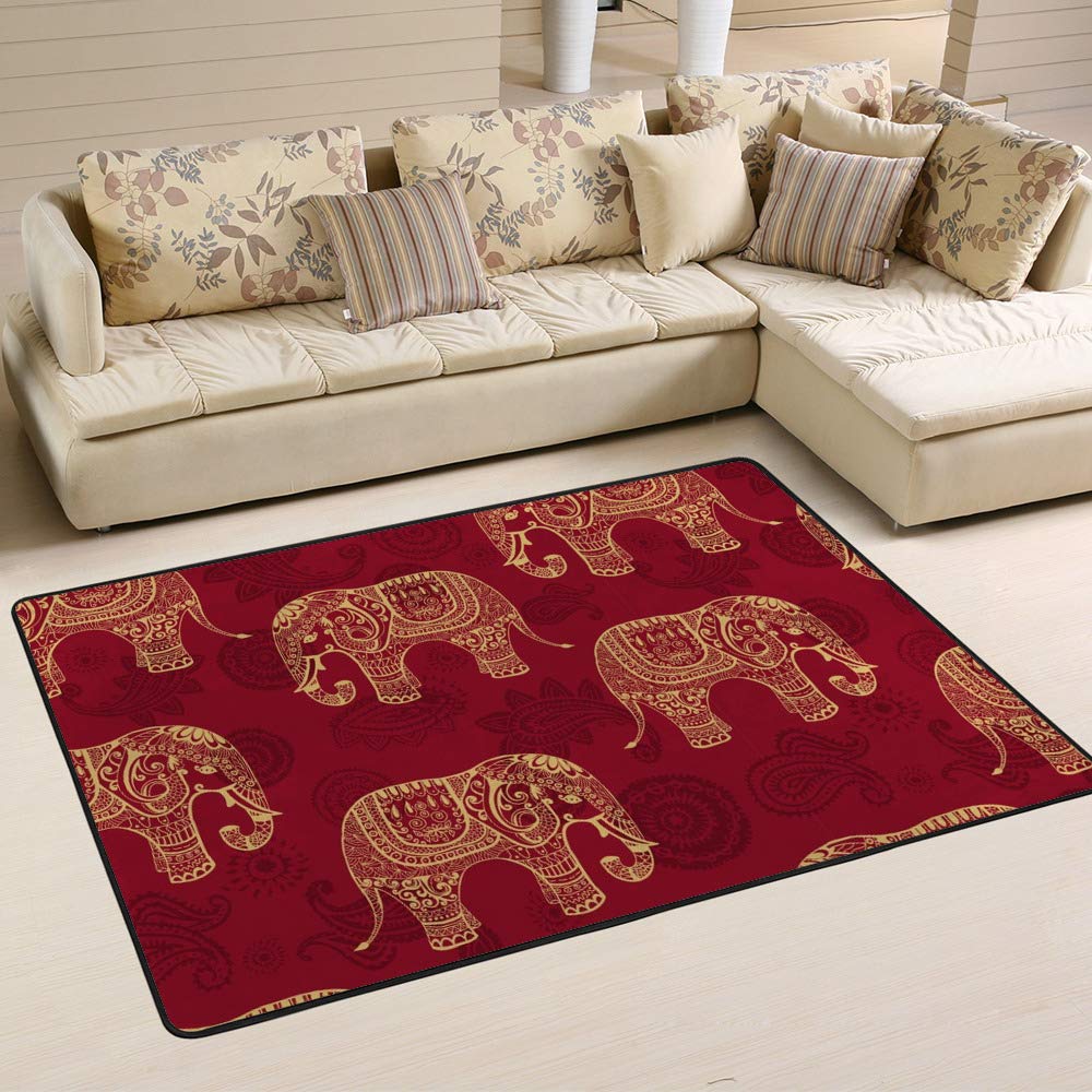 Tapis style indien bordeaux avec éléphants pour une chambre parentale cosy