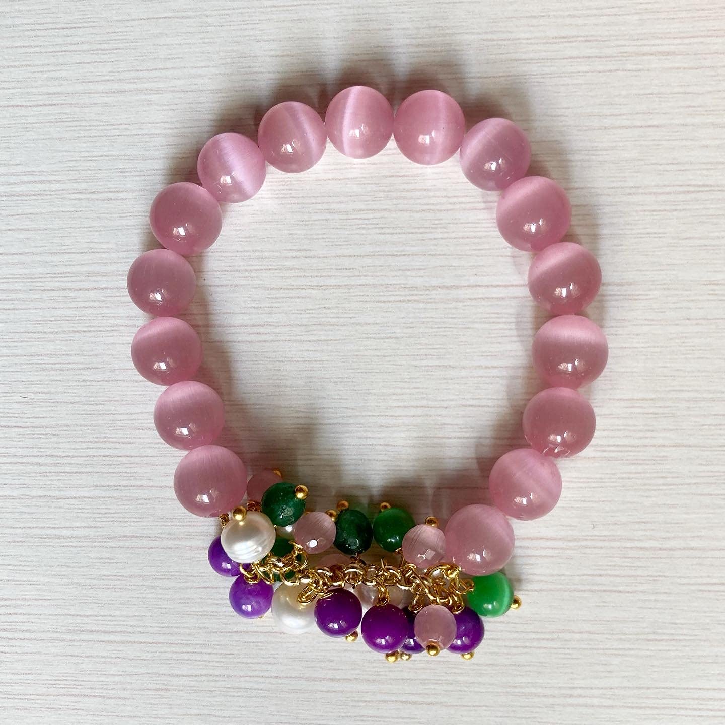 Parure in rosa, verde e viola