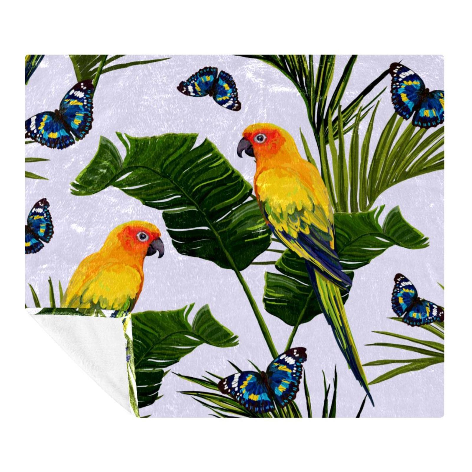 Plaid lit et canapé aux motifs feuilles tropicales et perroquet pour vos soirées