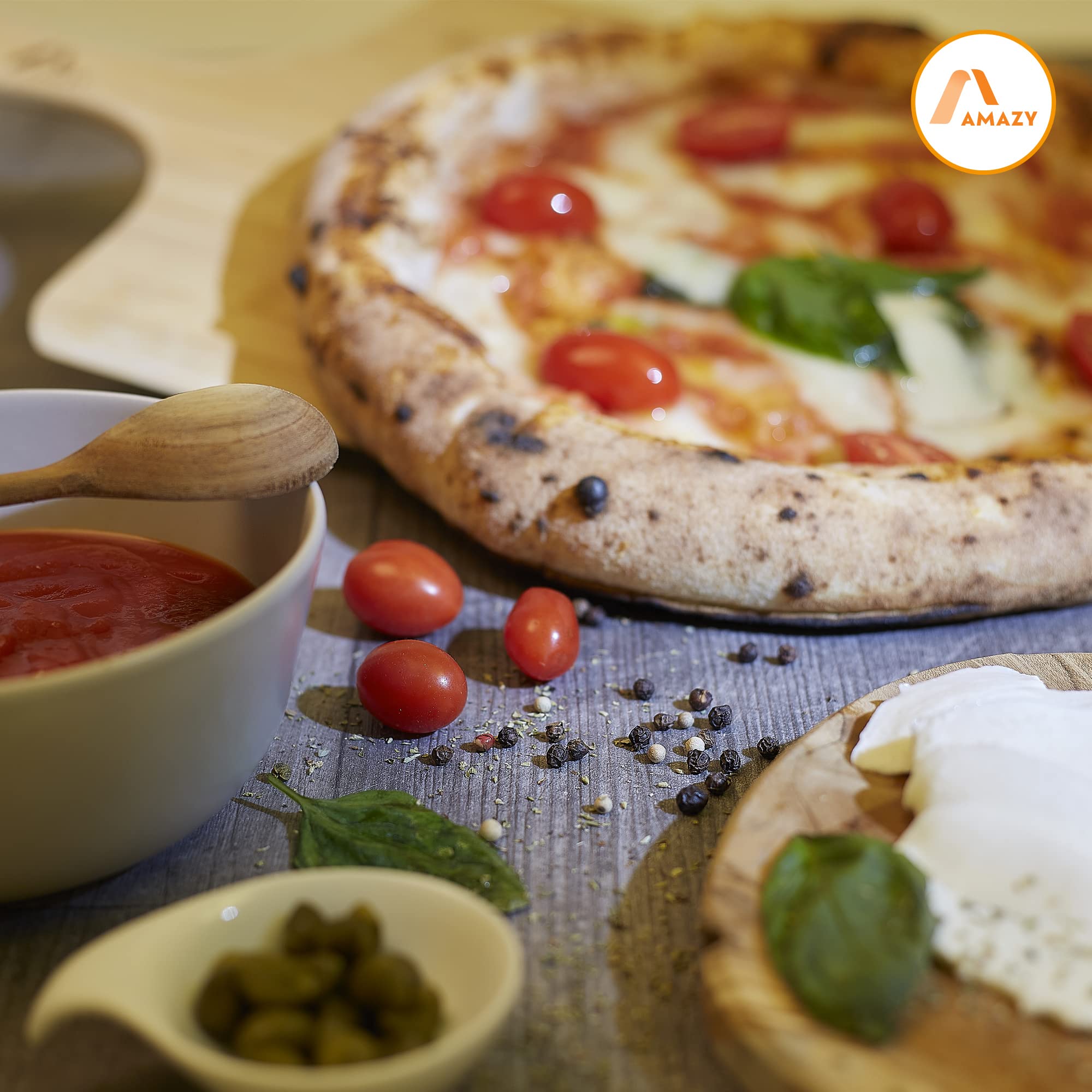 Amazy Pizzastein inkl. Bambus Pizzaschaufel, Dauerbackfolie und Beileger – Der Ultra-hitzebeständige Brotbackstein verleiht Ihrer Pizza den original italienischen Geschmack knuspriger Steinofenpizza