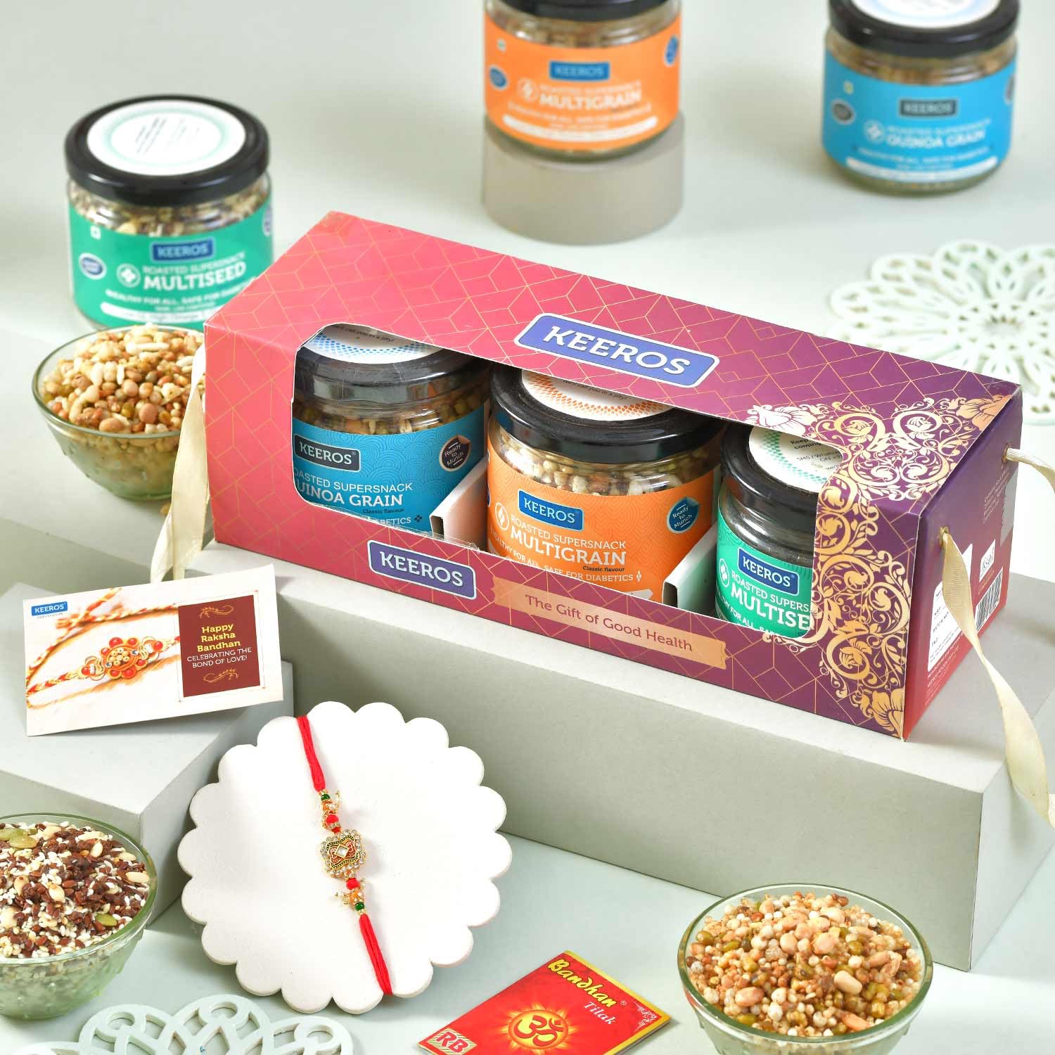 Keeros Healthy Holi Gift Hamper for Family & Friends |Combo of Sweet & Salted, Tasty & Nutritious Super Snacks in Glass Jars in a Premium Gift Hamper-image-1