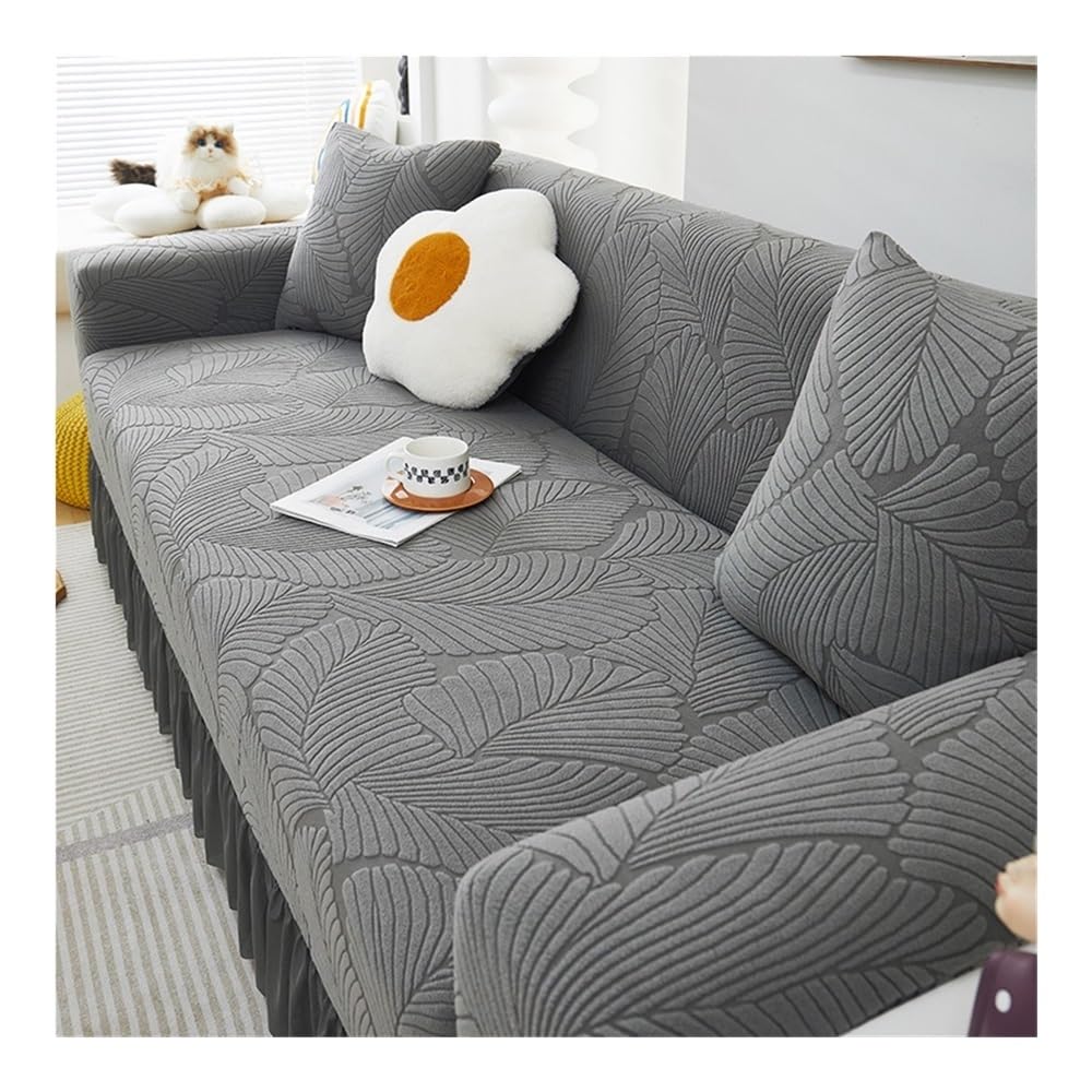 Housse de canapé 4 places au motif feuilles gris foncé pour décorer le salon