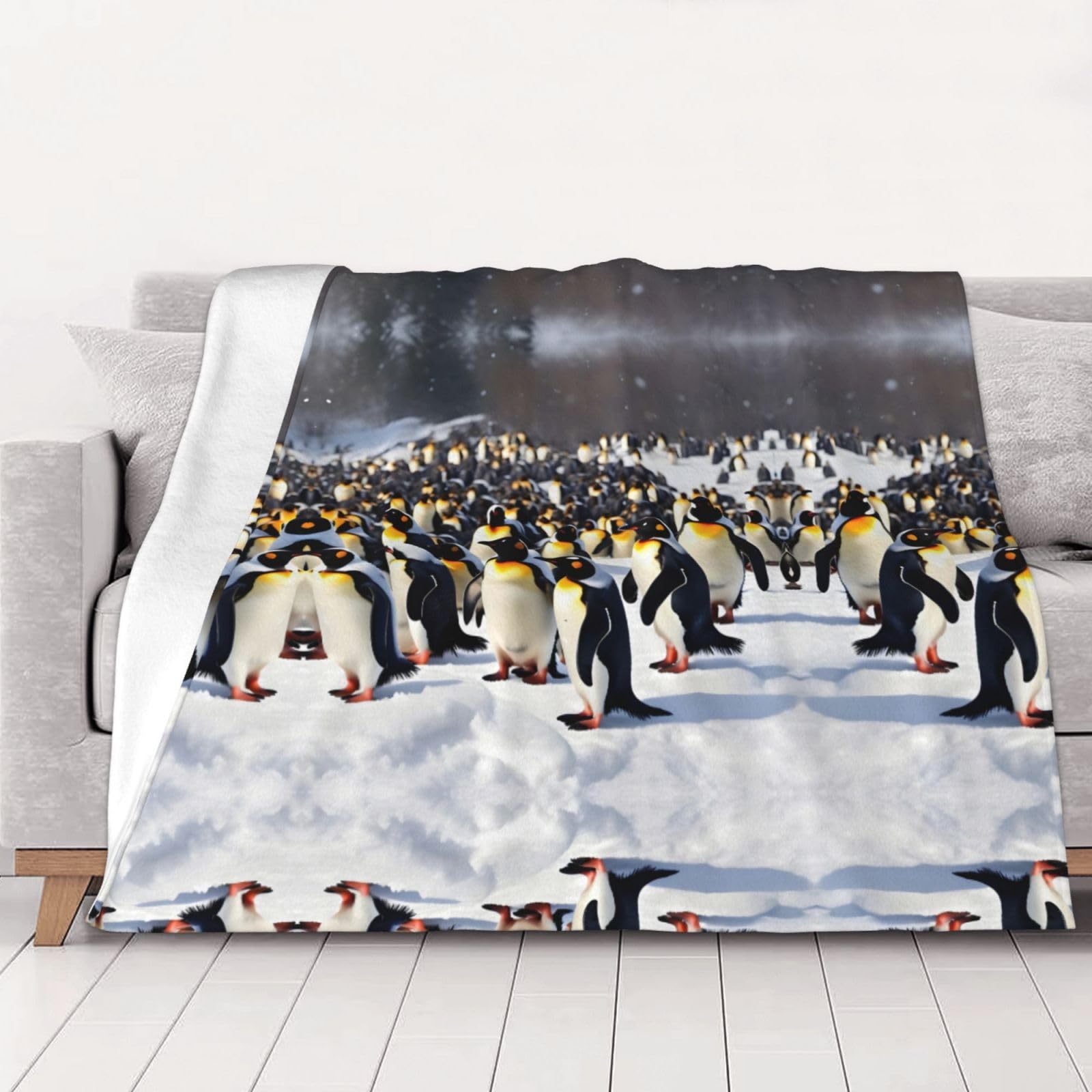 Couverture polaire pingouins pour un dimanche cocooning sur le canapé