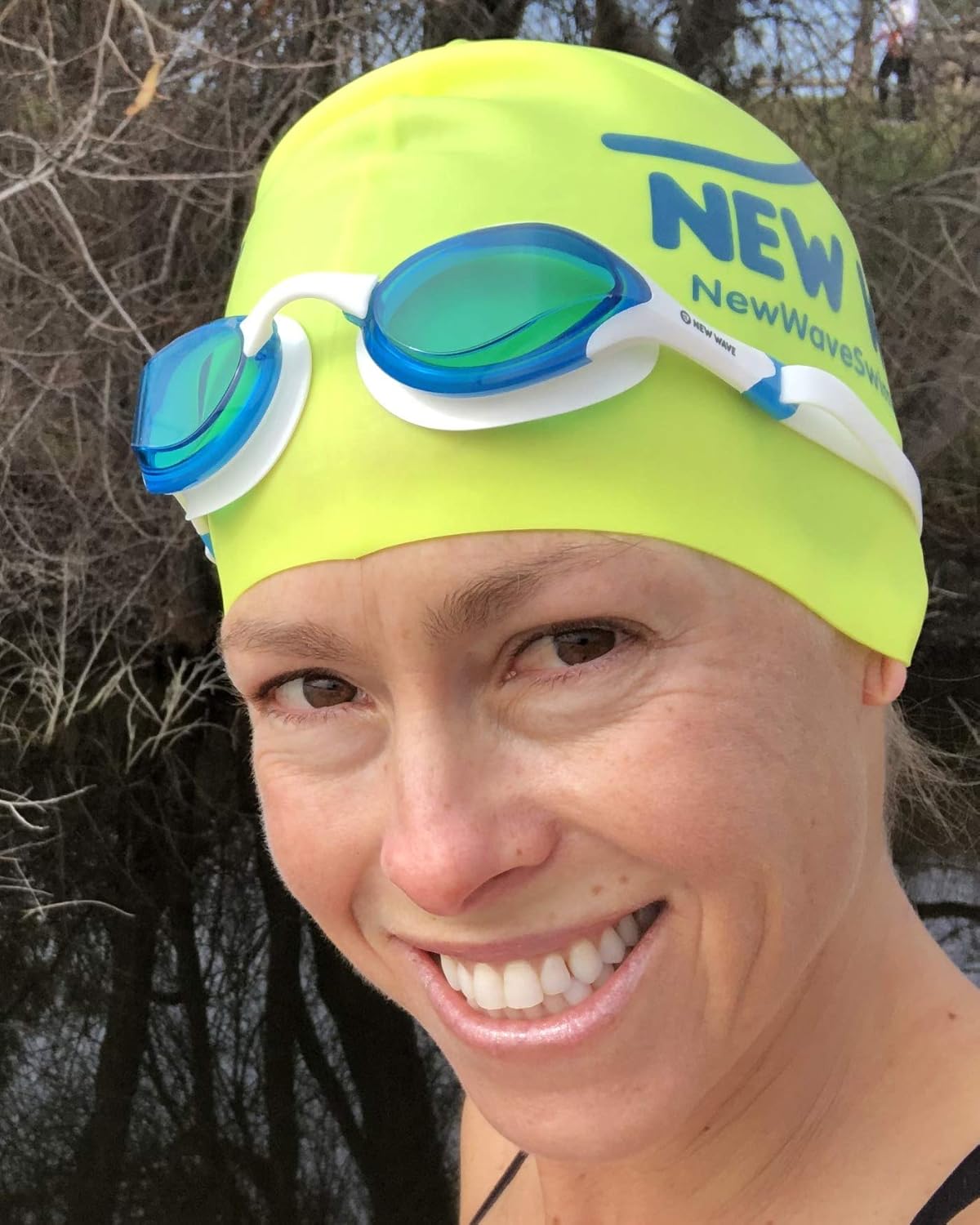 New Wave Swim Goggles with Protective Storage Case - Anti Fog Lenses, Four Nose Bridges for Triathlon & Open Water Swimming (Blue Ice = Clear Blue Lens in White Frame)