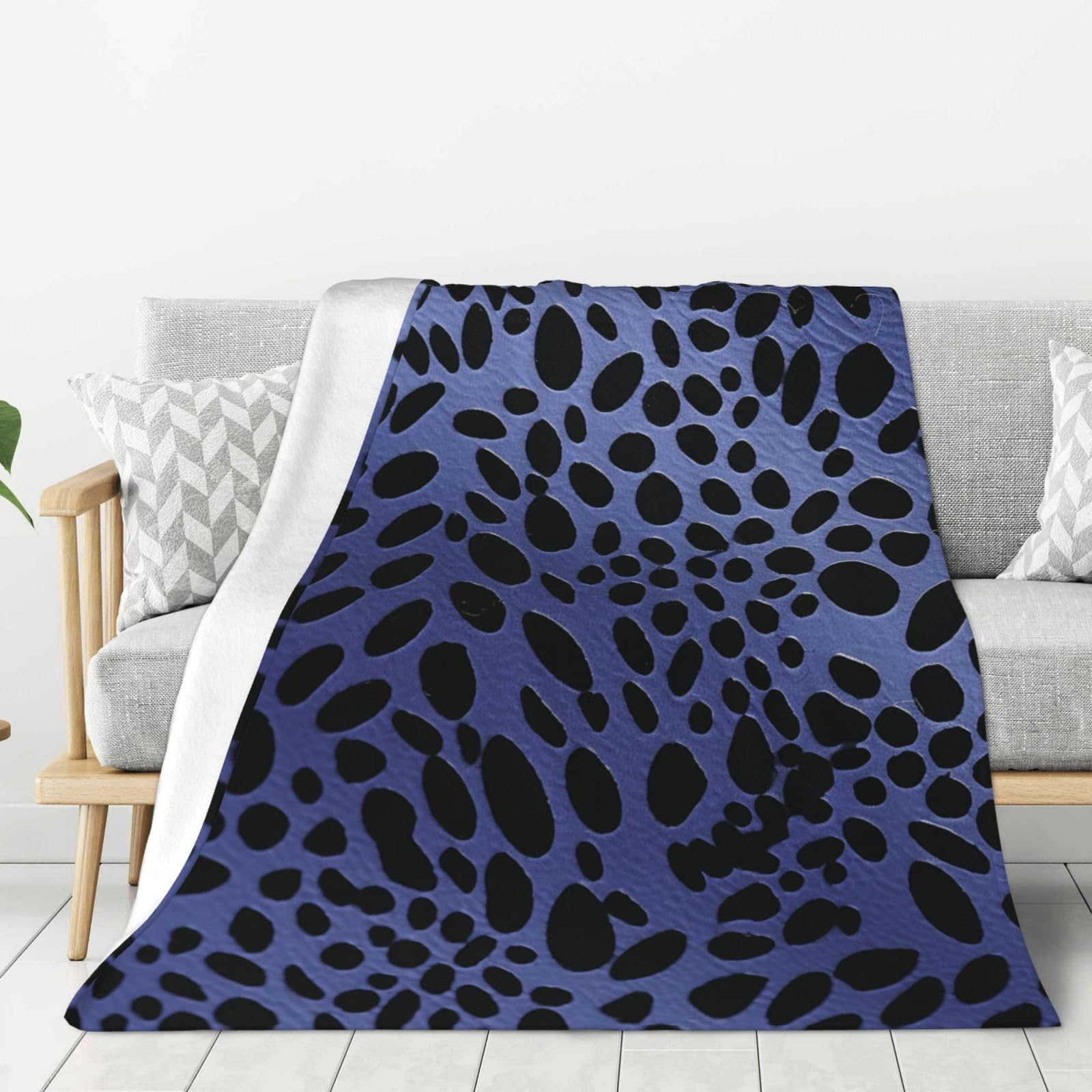 Couverture en flanelle douce pour soirée cocooning sur le canapé ou nuit paisible au lit