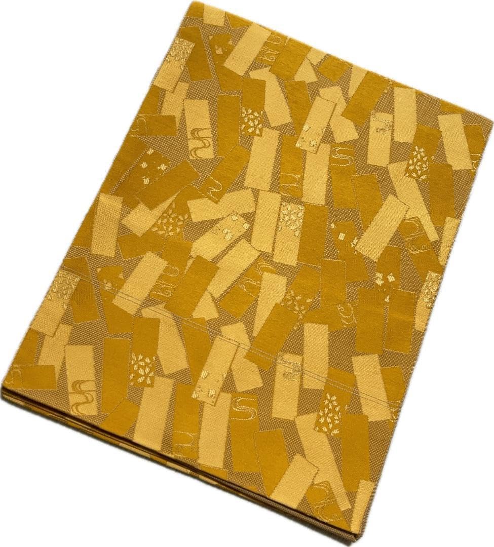 C0468名古屋帯 松葉仕立て 茶系の黄土色 377㎝ 短冊柄