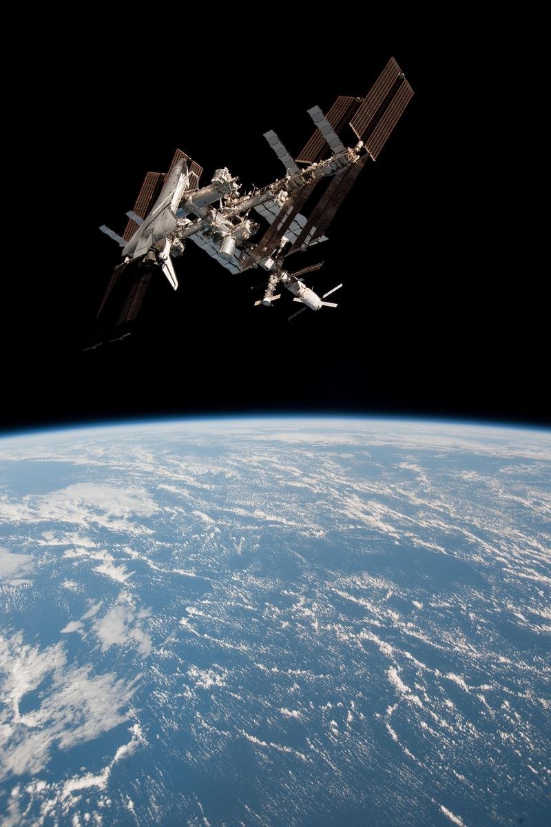 Laminated 24x36 Poster: The International Space Station and The Docked Space Shuttle Endeavour NASA