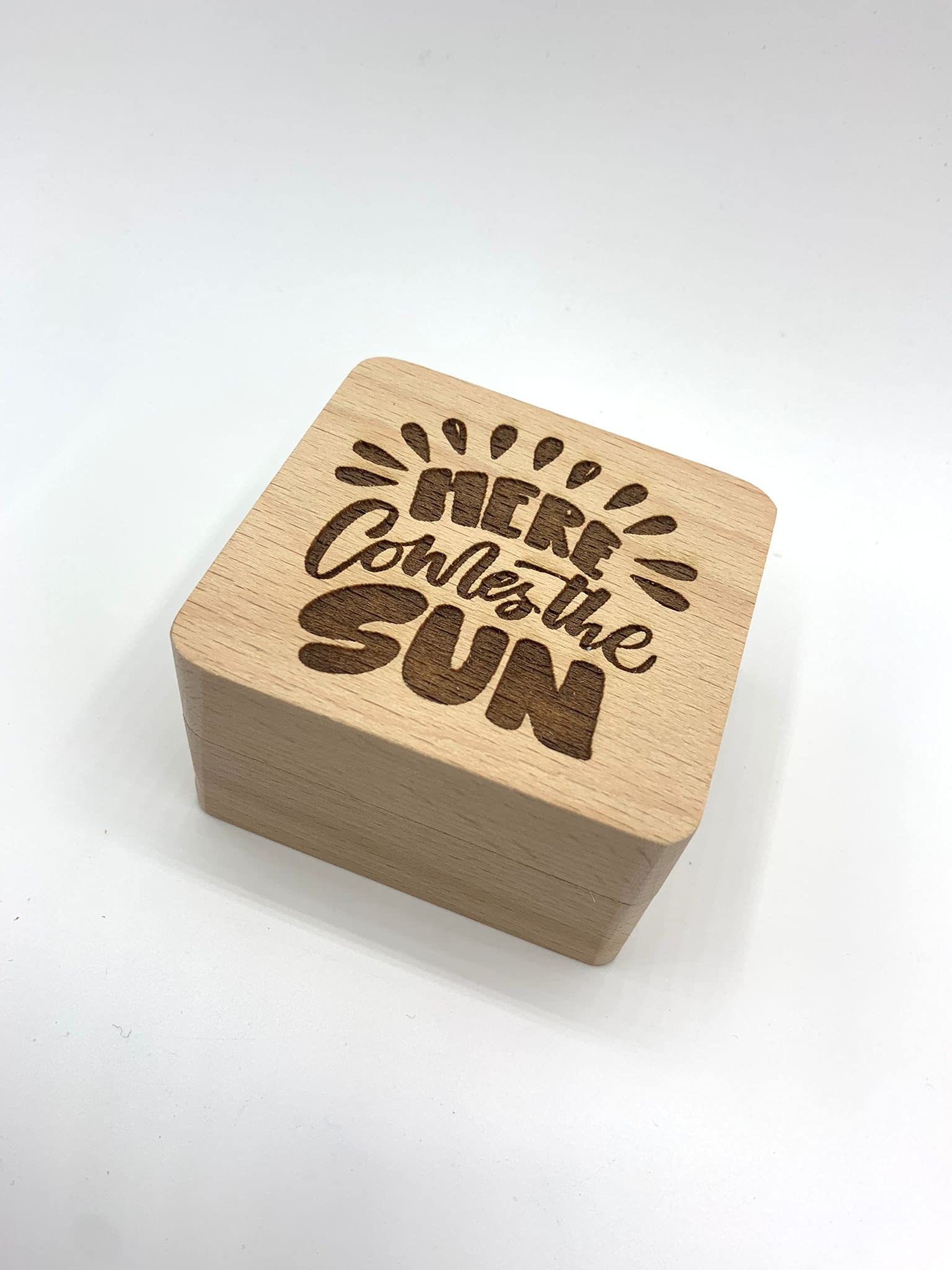 Music box. Laser engraved beech box with a wind-up crank music mechanism. Beautiful melodies and exclusive designs (Here comes the sun)