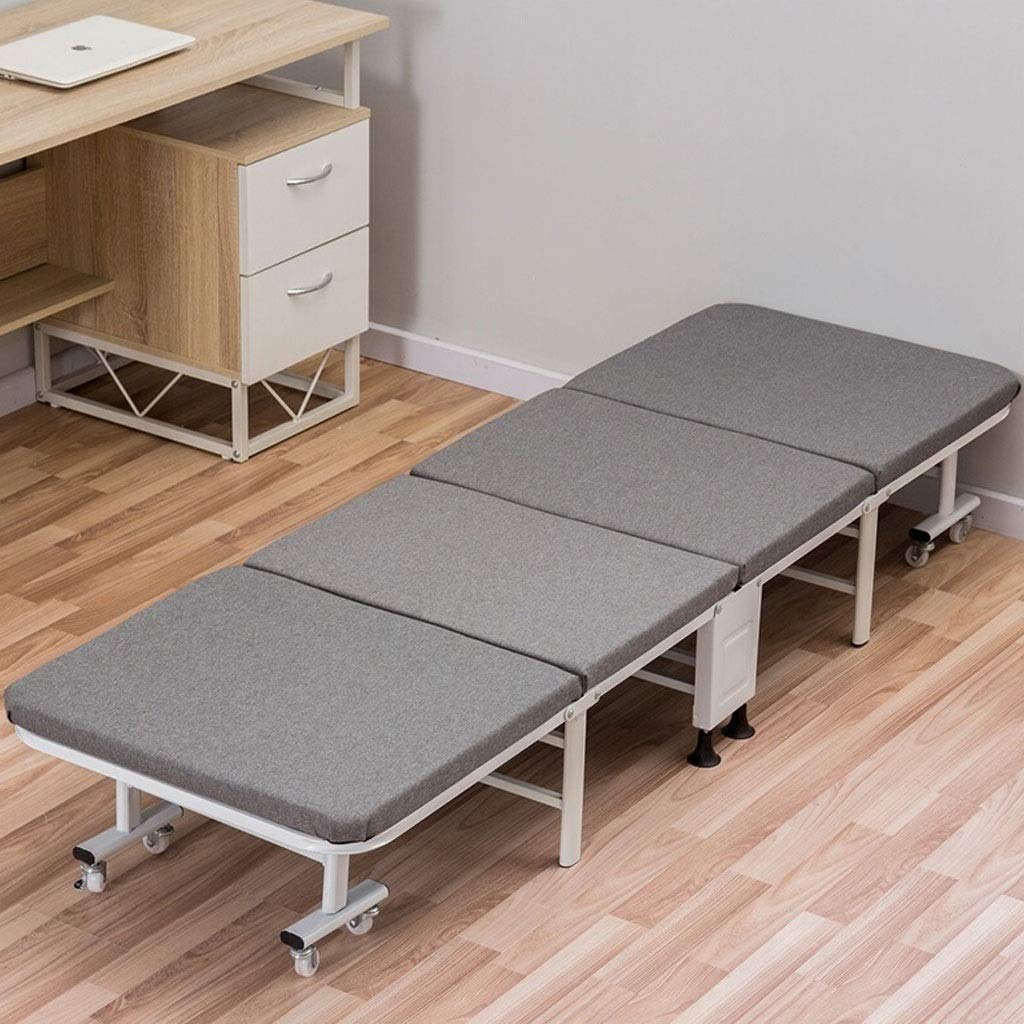 Lit pliable quatre plis contre la fatigue au bureau et l'inconfort