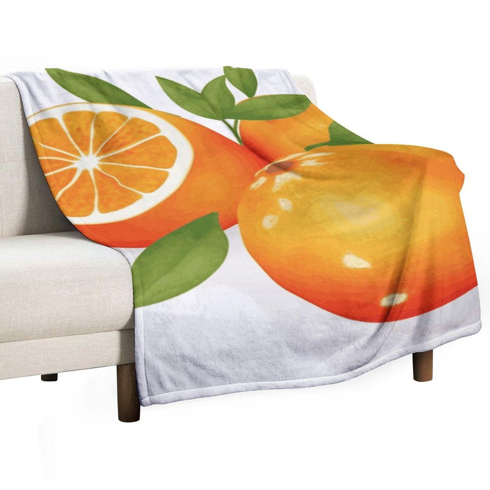 Couverture polaire orange contre les frissons nocturnes sur le lit ou le canapé