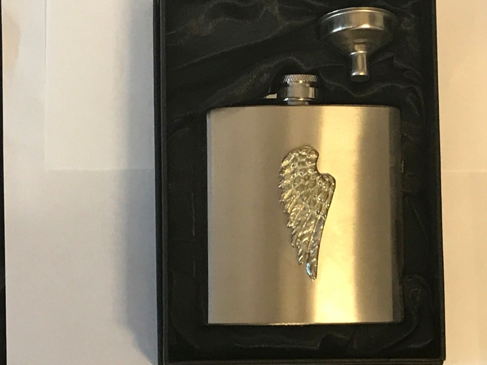 Flasque ailes d'ange anti-fuite en acier inoxydable pour transporter vos boissons sans risque