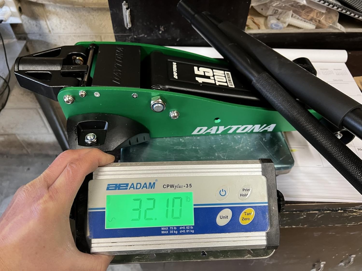 Daytona Floor Jack on a scale showing 32.10 lbs