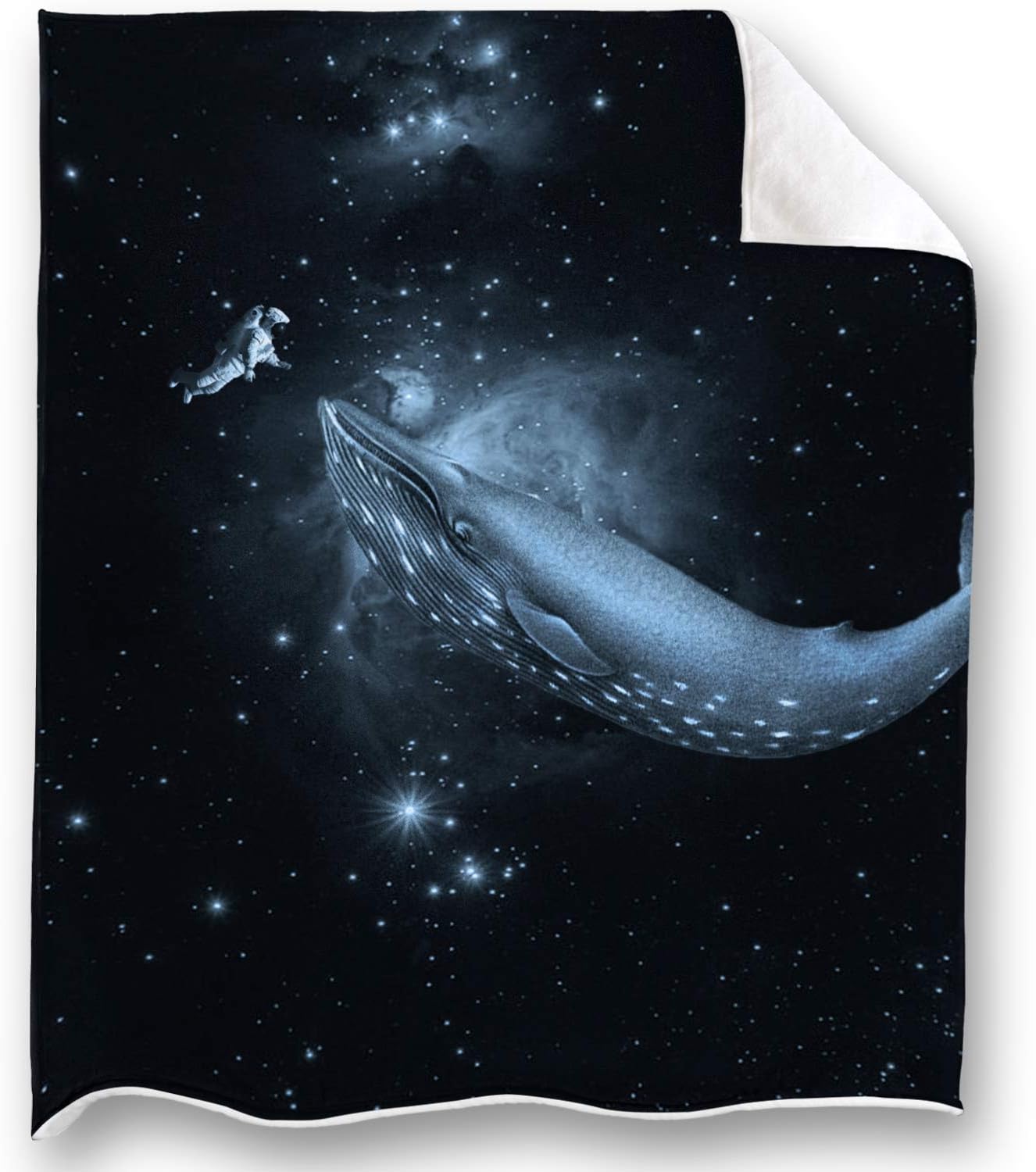 blanket with a whale floating on it.  