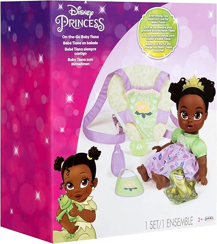 Miniatura 8 de Disney - Muñeca de la princesa Baby Tiana de lujo con tiara, portabebé, amigo de felpa, chupón, babero y biberón [Exclusivo de Amazon]