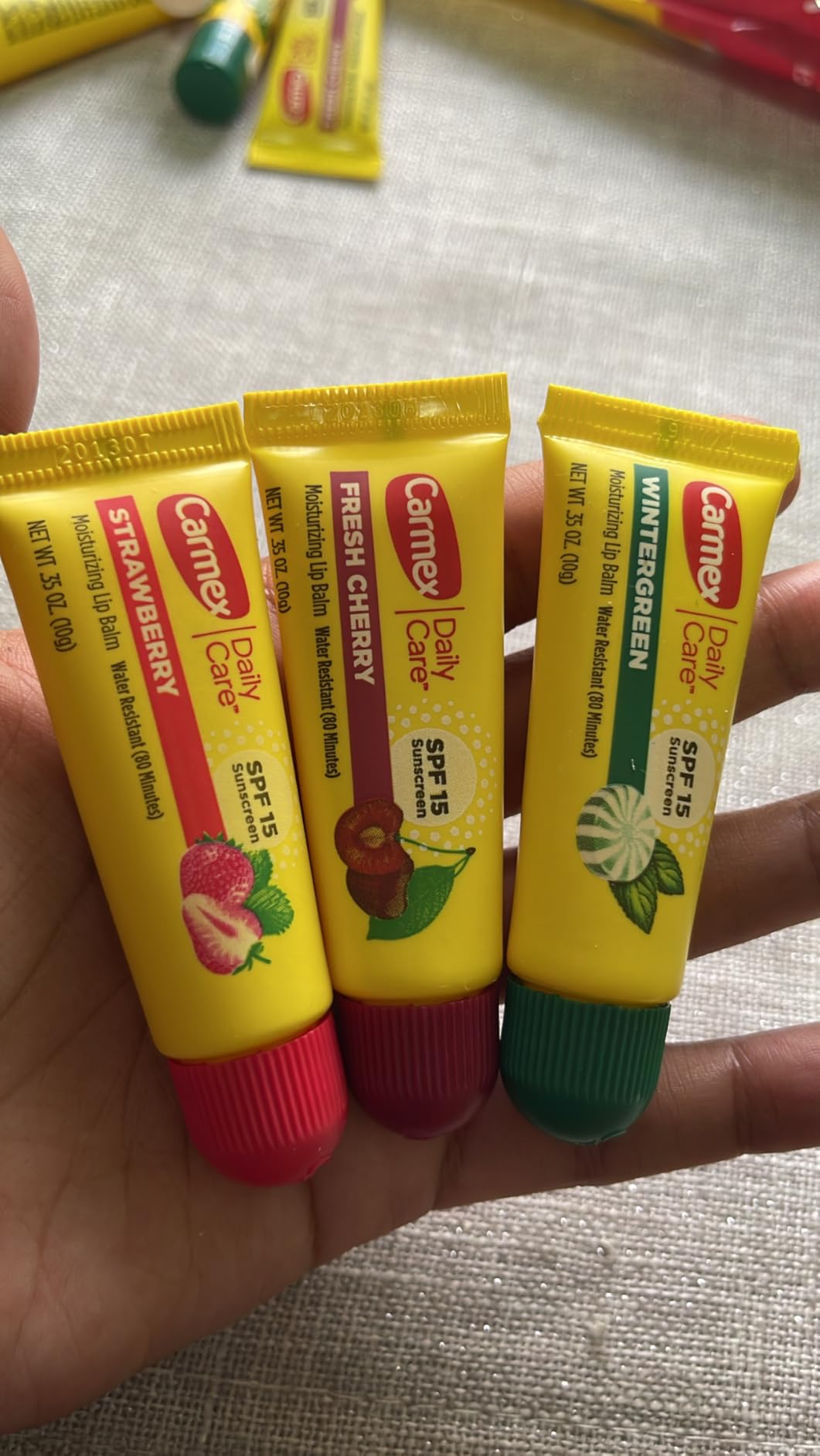 Carmex Daily Care Moisturizing Lip Balm Pack, SPF 15, Multi-Flavor Lip Care Variety Pack Bag, 9 Count (3 Tubes, 6 Sticks)