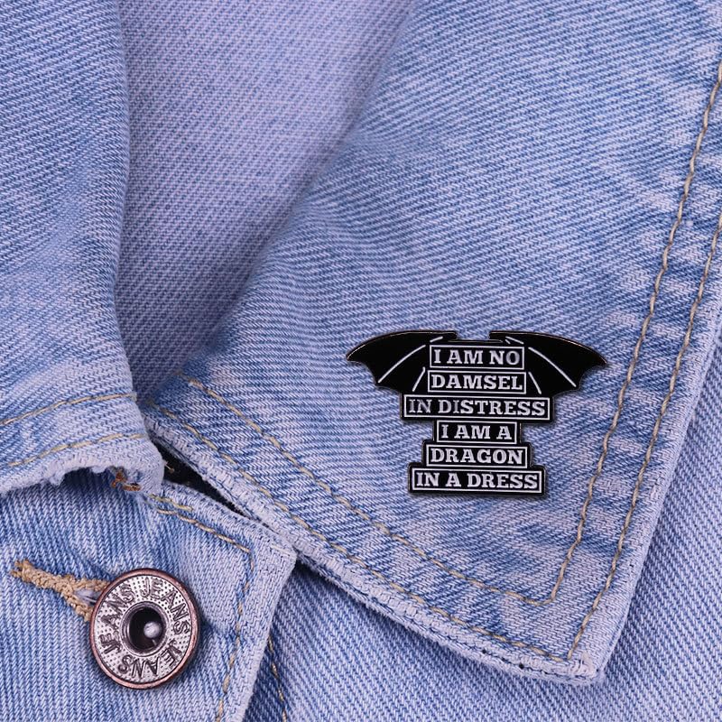 Image of I am no damsel in distress I am a dragon in a dress Enamel Lapel Pin badge brooch wearing a skirt and a feminist badge