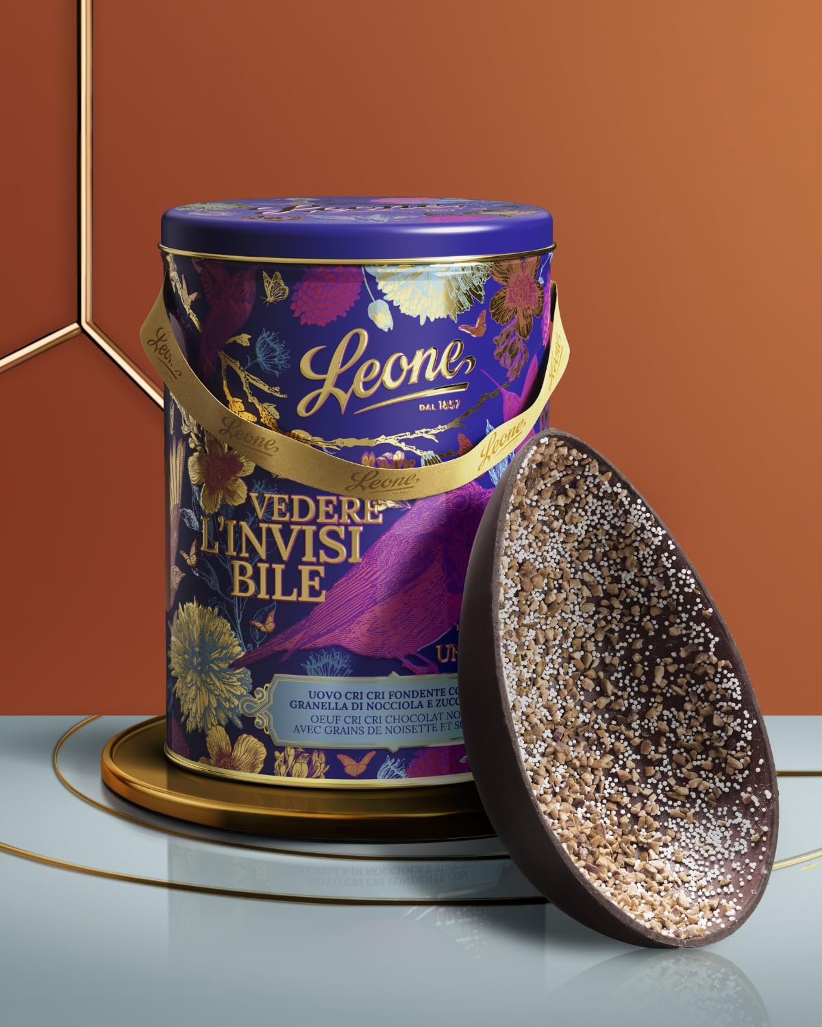 Leone dal 1857 - Uovo di Pasqua Cri Cri - Uovo di Cioccolato Fondente 70% con Granella di Zucchero e Nocciole - in Latta Regalo - Con Sorpresa - Vegano e Senza Glutine - 350g