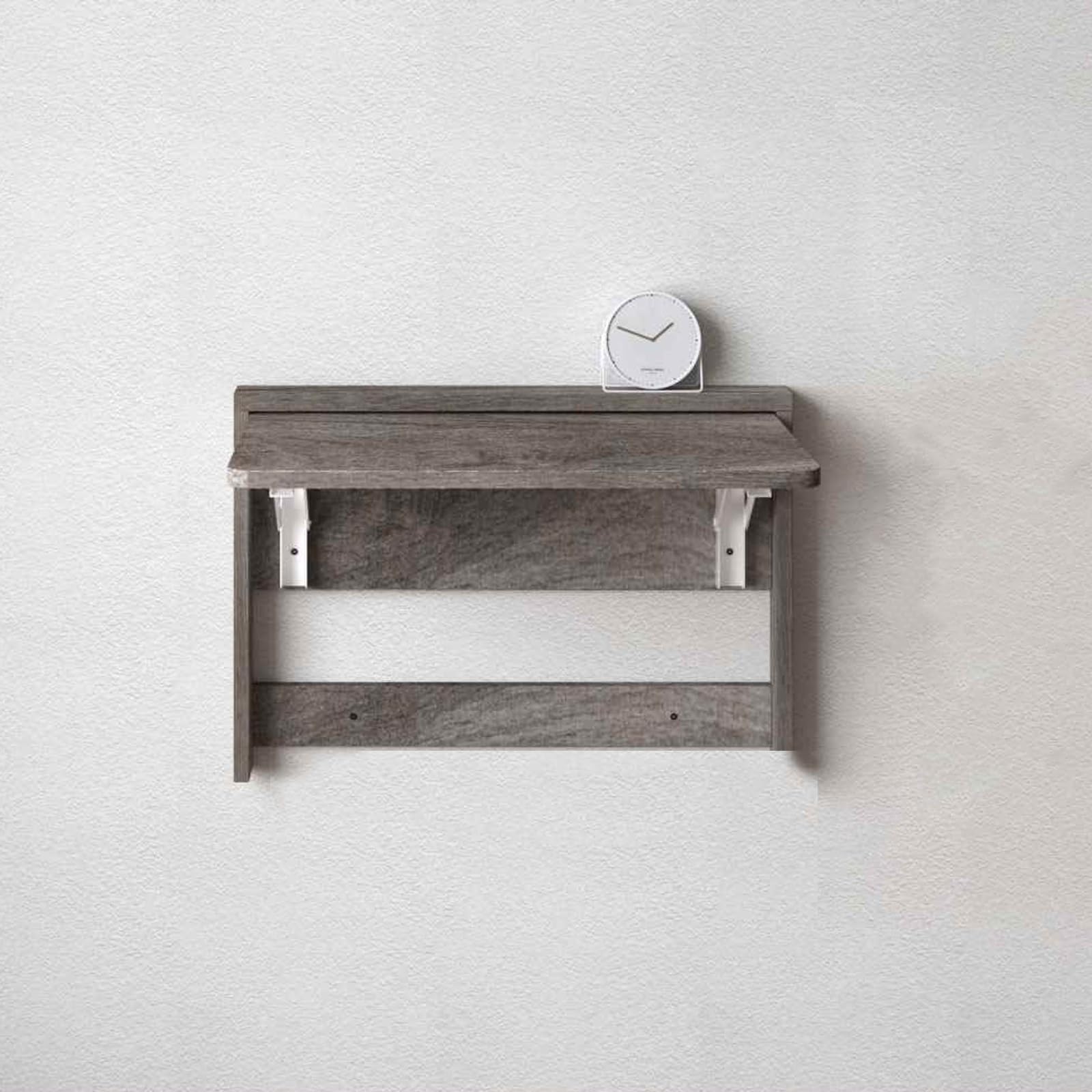 Table murale rabattable noire pour optimiser le coin repas d'une petite cuisine