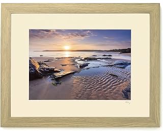 Mounted or framed photograph by Andrew Ray featuring sunrise over Harlyn Bay Beach in Cornwall.
